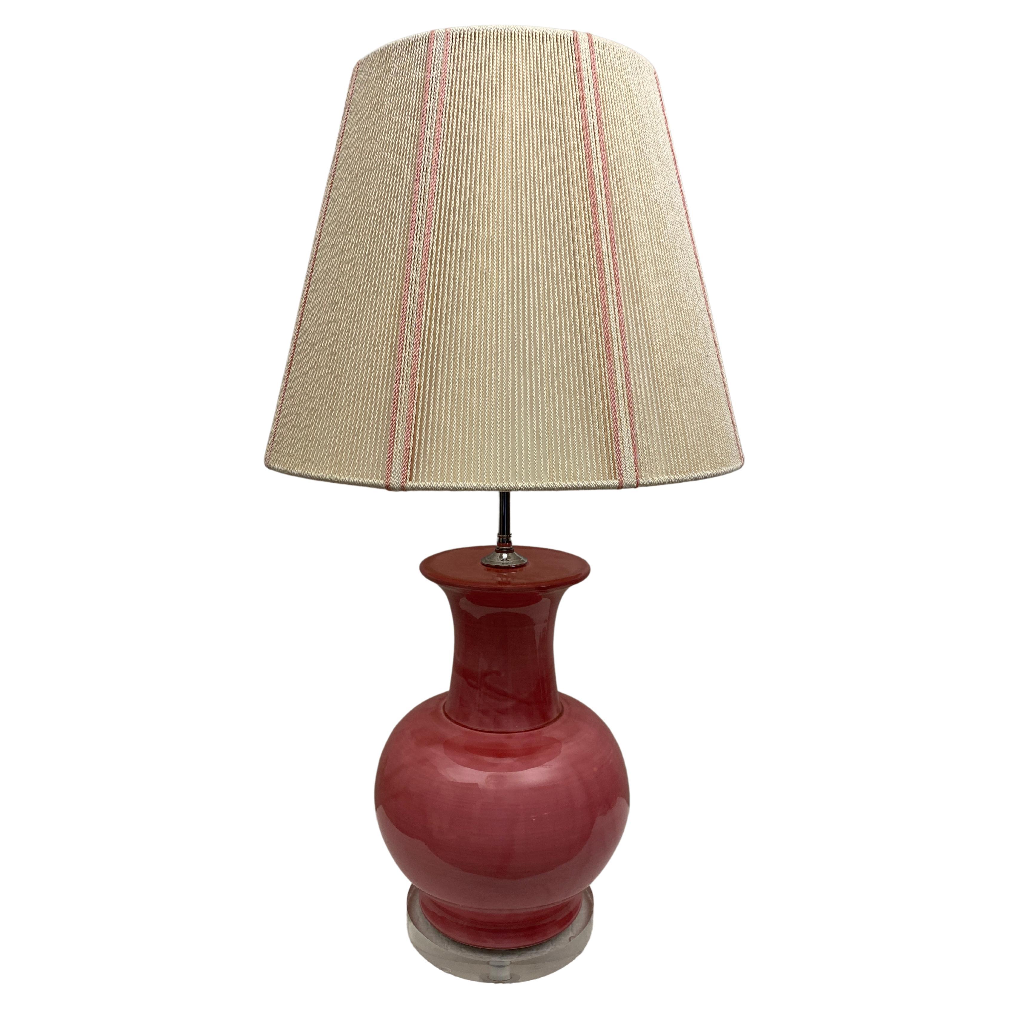 A fine quality pink glazed ceramic and lucite Table Lamp, circa 1980s. 
Newly rewired.

This pale pink glazed ceramic table lamp with a lucite base and final is in perfect vintage condition. The lucite base makes the lamp taller and more chic.