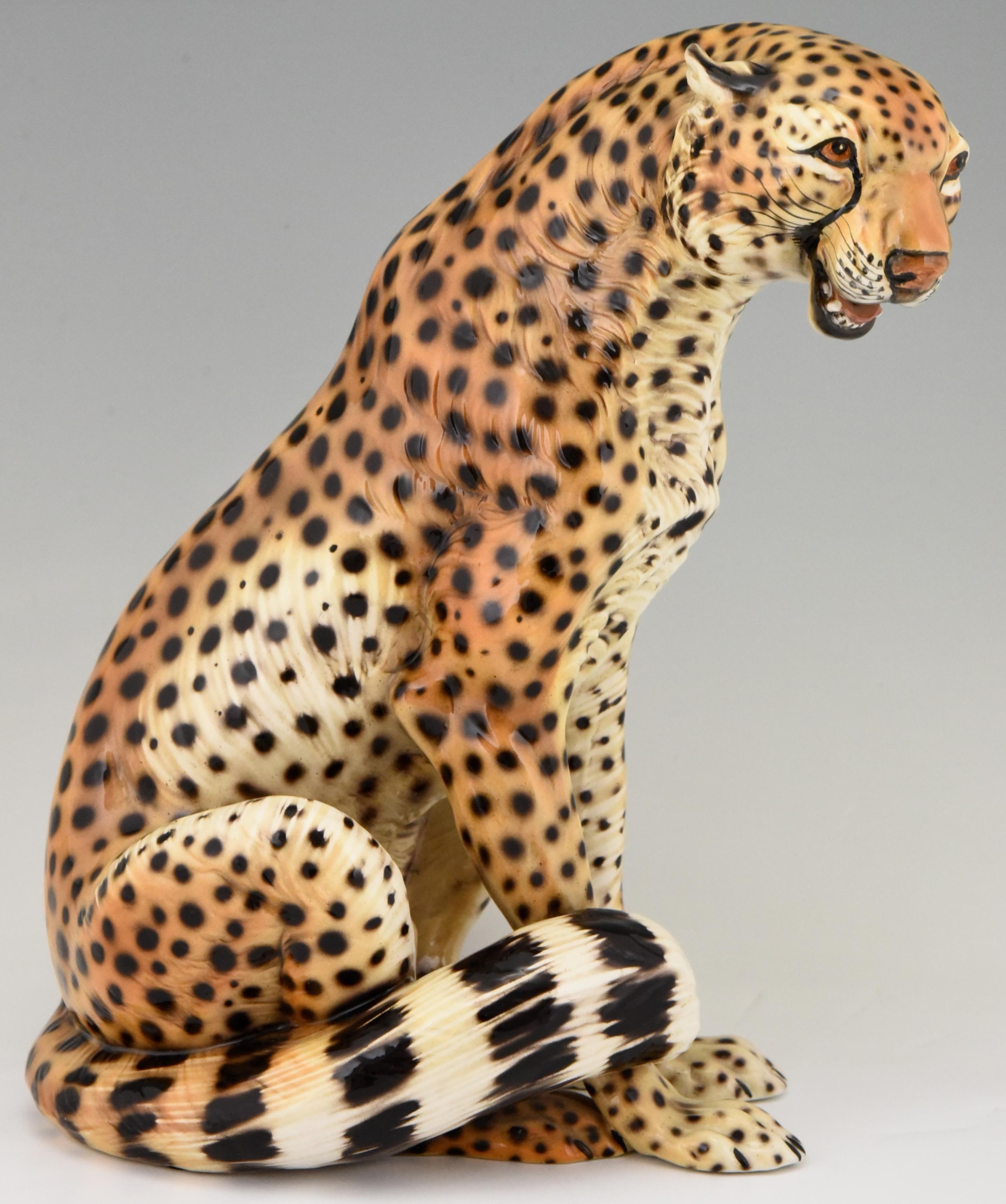 A beautiful and tall hand painted ceramic sculpture of a cheetah, leopard by Giovanni Ronzan Torino, Italy, 1960s
Signed and numbered.

Giovanni Ronzan and his brothers founded the Ronzan factory in 1940 after he has left his job as chief painter