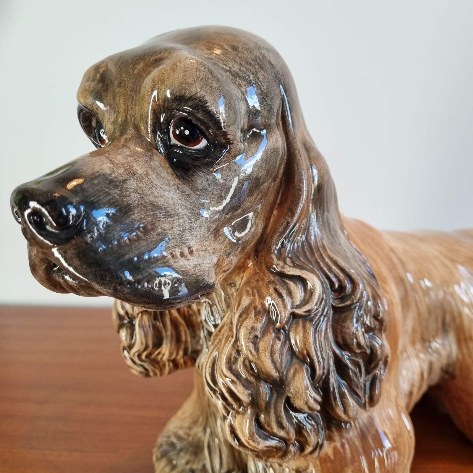 Estatua italiana de perro Cocker Spaniel pintada a mano.
Fabricado por el fabricante italiano C.I.M.

En excelente estado.

Sin daños ni signos de uso.