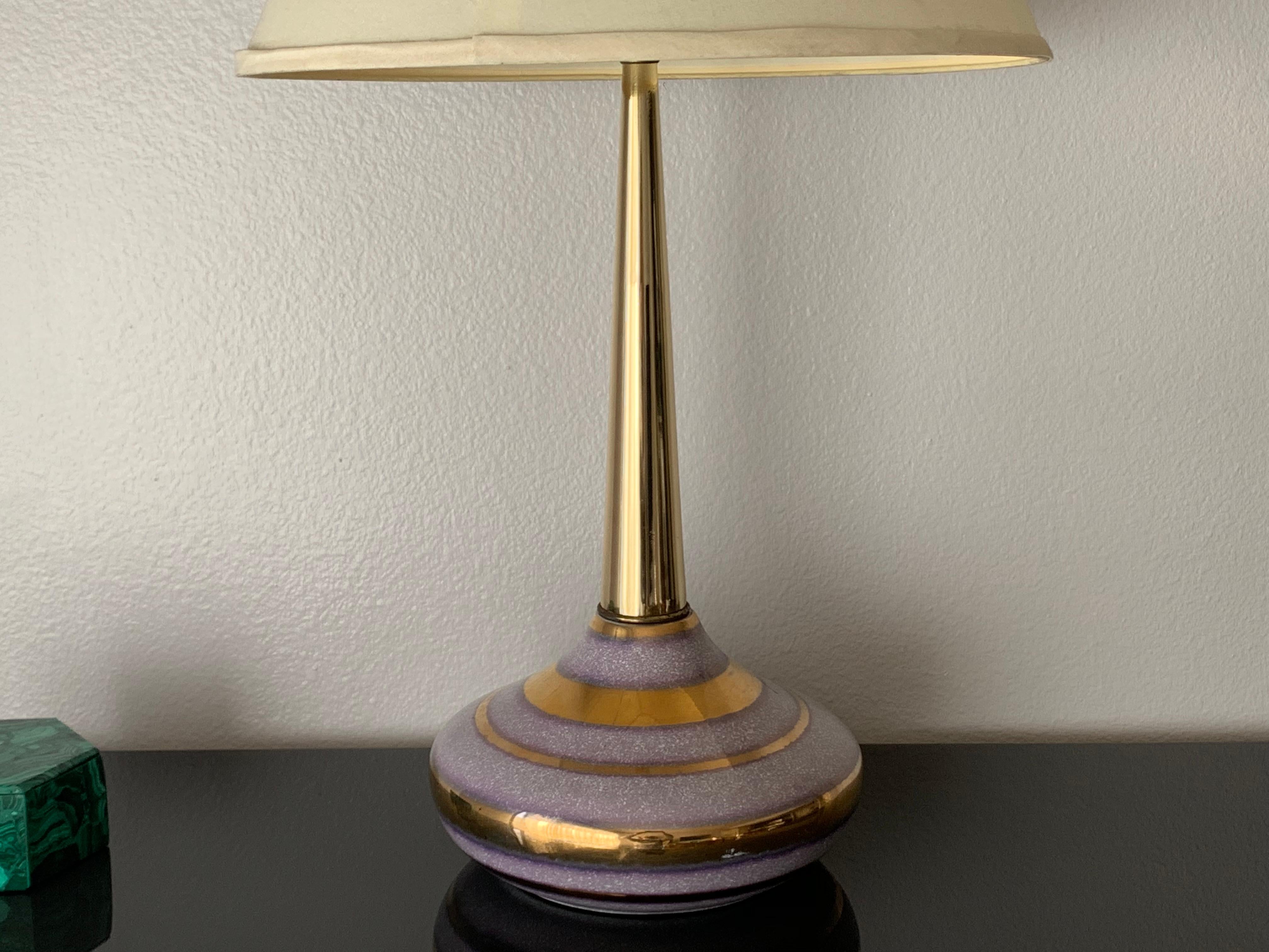 Midcentury ceramic gold glaze lamp. Measures 31