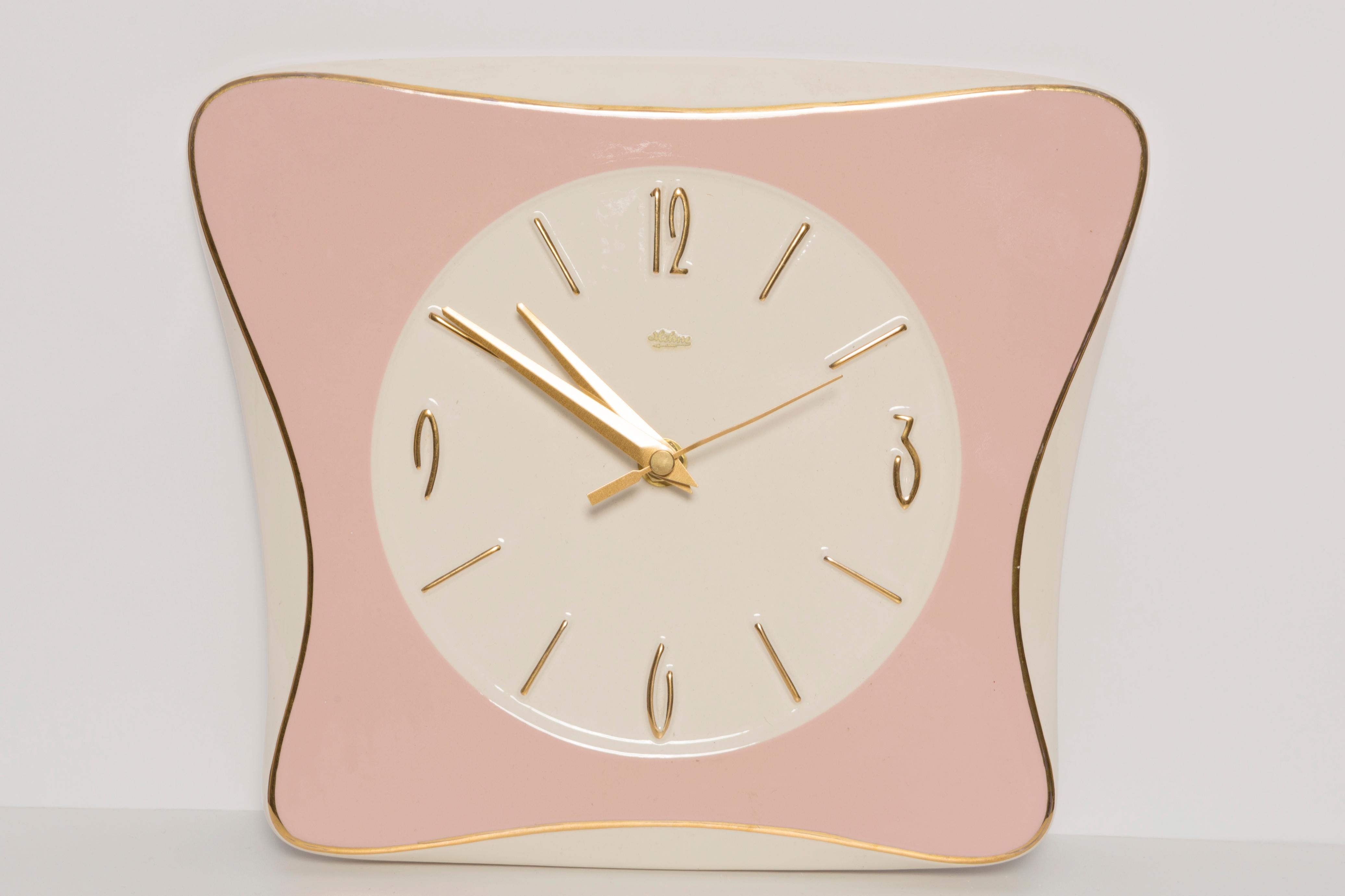 Mid Century Ceramic Pink and White Wall Clock. 
Designed and produced by Mehne Company in Germany during late 1960s. 
Standard battery. Only one unique piece. 
Very good original vintage condition. 