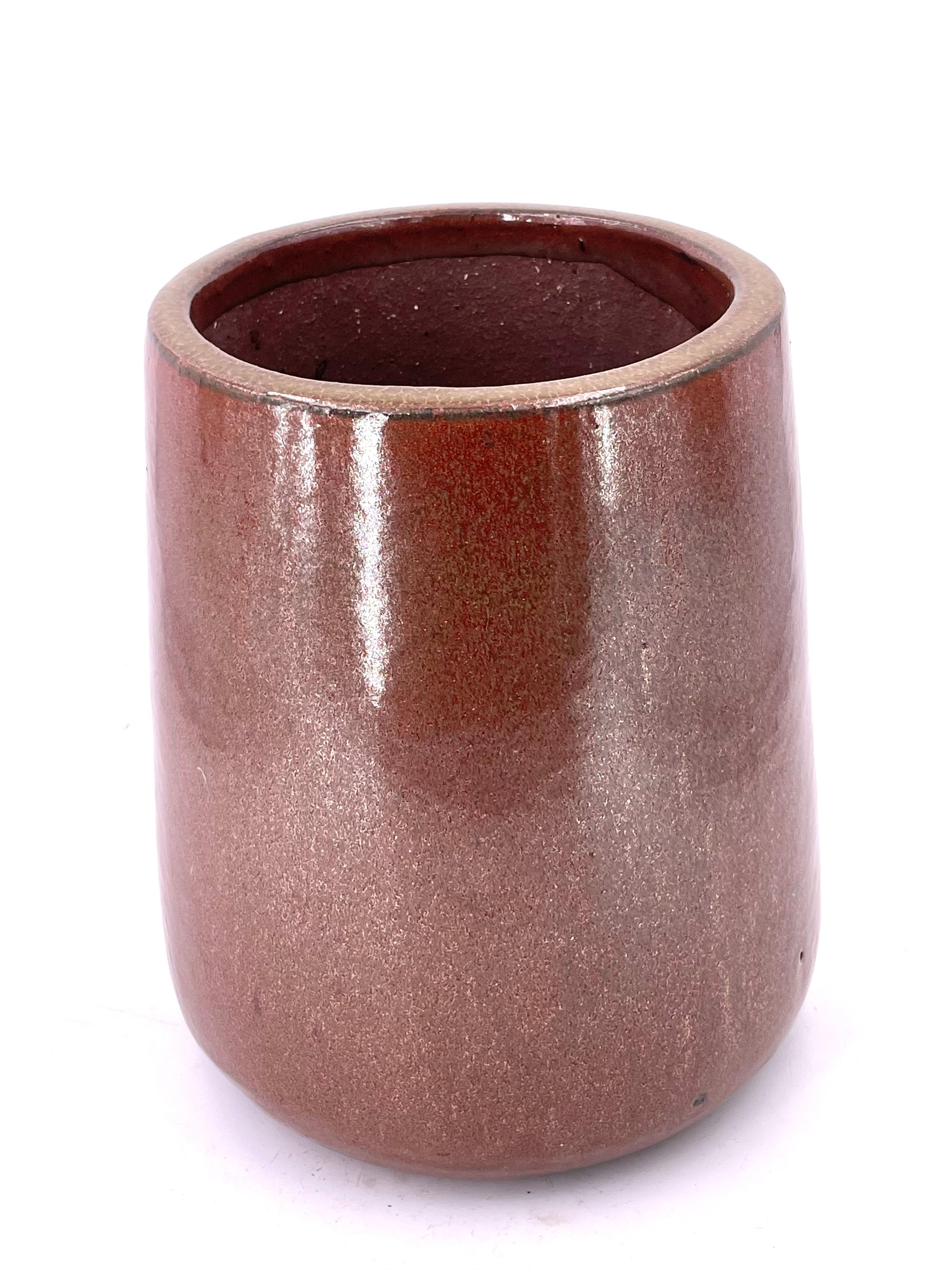 Beautiful glaze and shape on this unique planter architectural pottery style. With hole on the bottom for drainage.