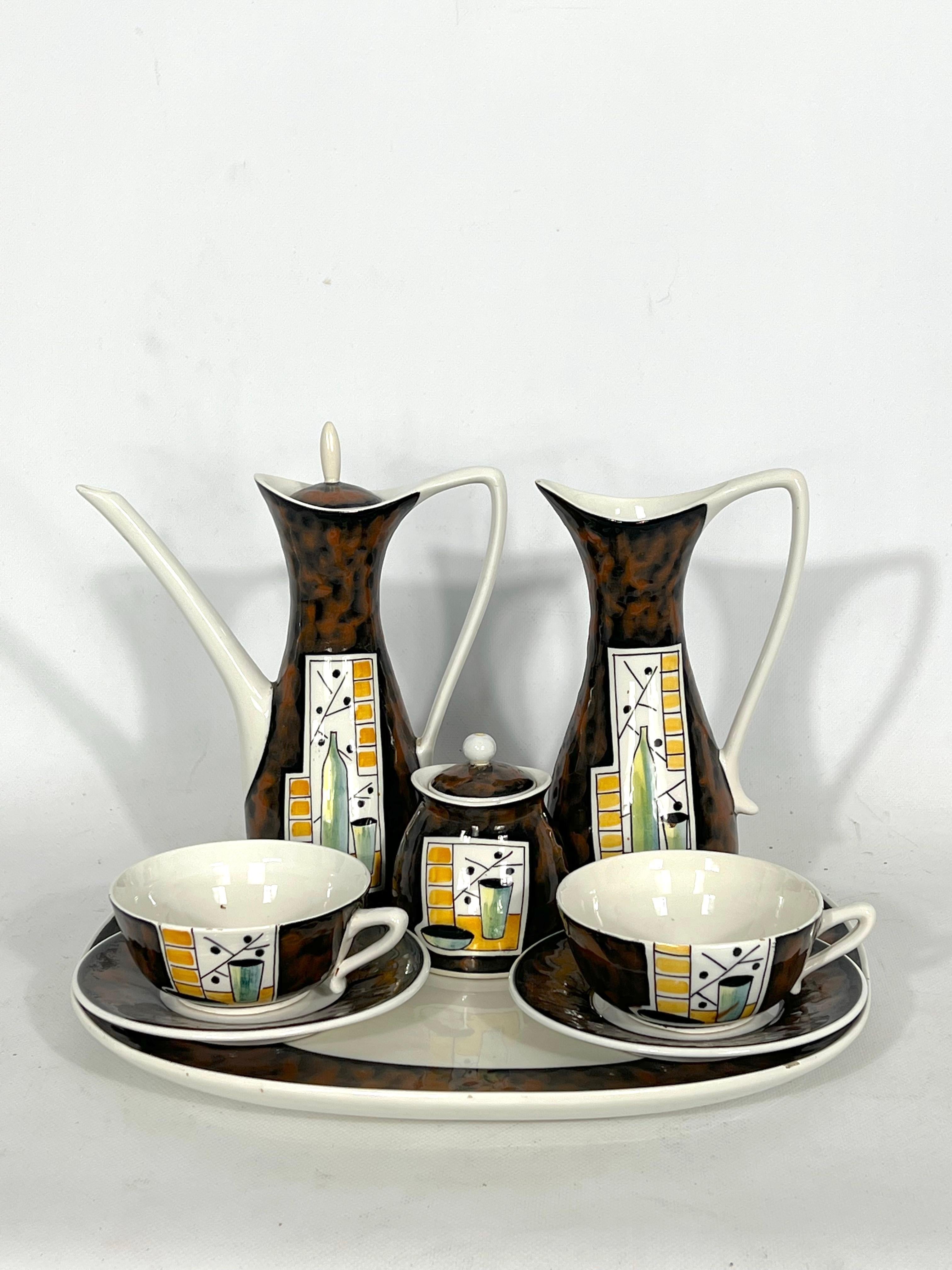 Good vintage condition with normal trace of age and use for this teapot set made from ceramic and produced in Italy during the 50s by Alfa Ceramiche.