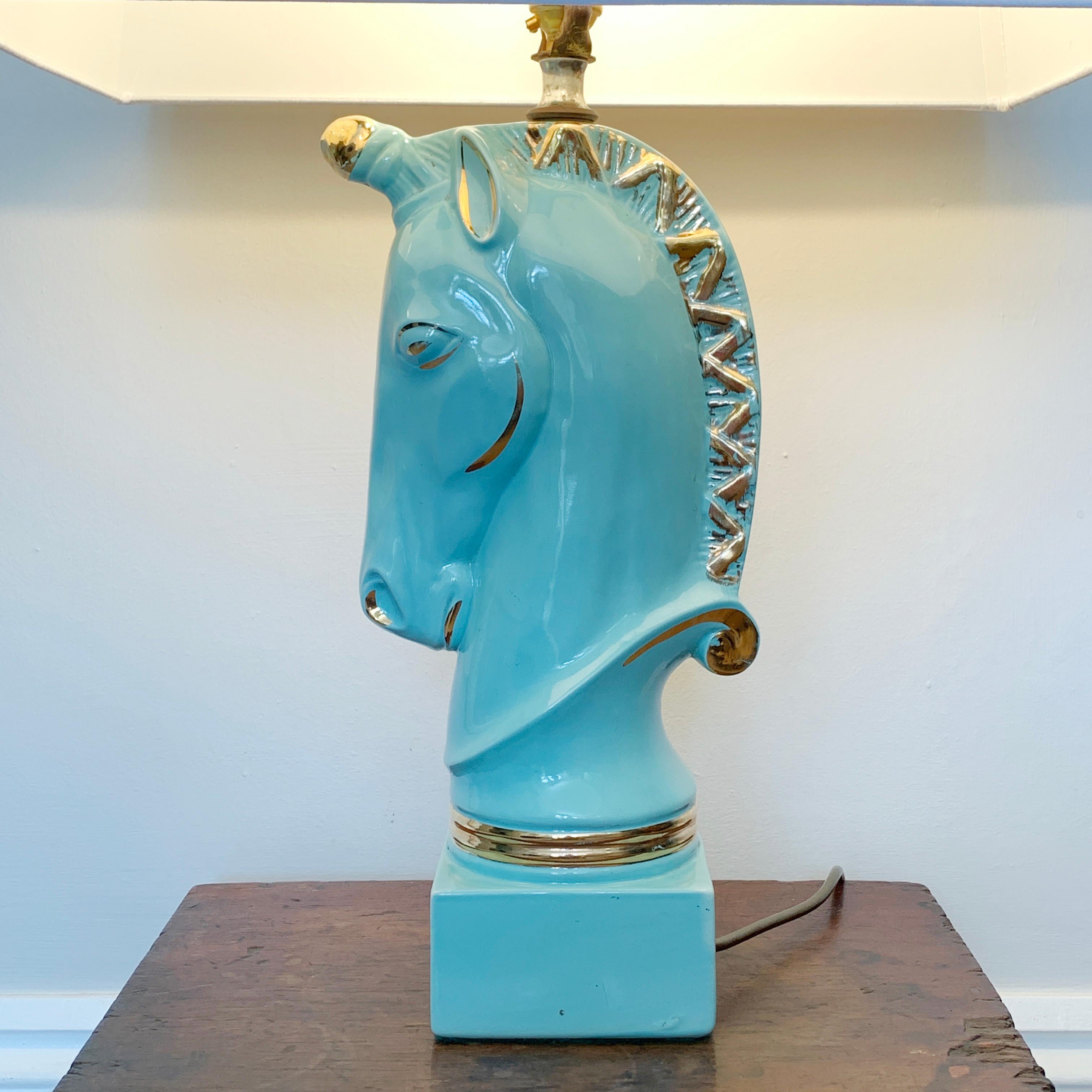 Mid century ceramic unicorn table lamp
1950s
Stunning unicorn horse head lamp in the most fabulous turquoise color with gilt highlights
The lamp has been re-wired and pat tested by the previous owner
Lamp base alone 45cm height, 18cm depth, 11cm