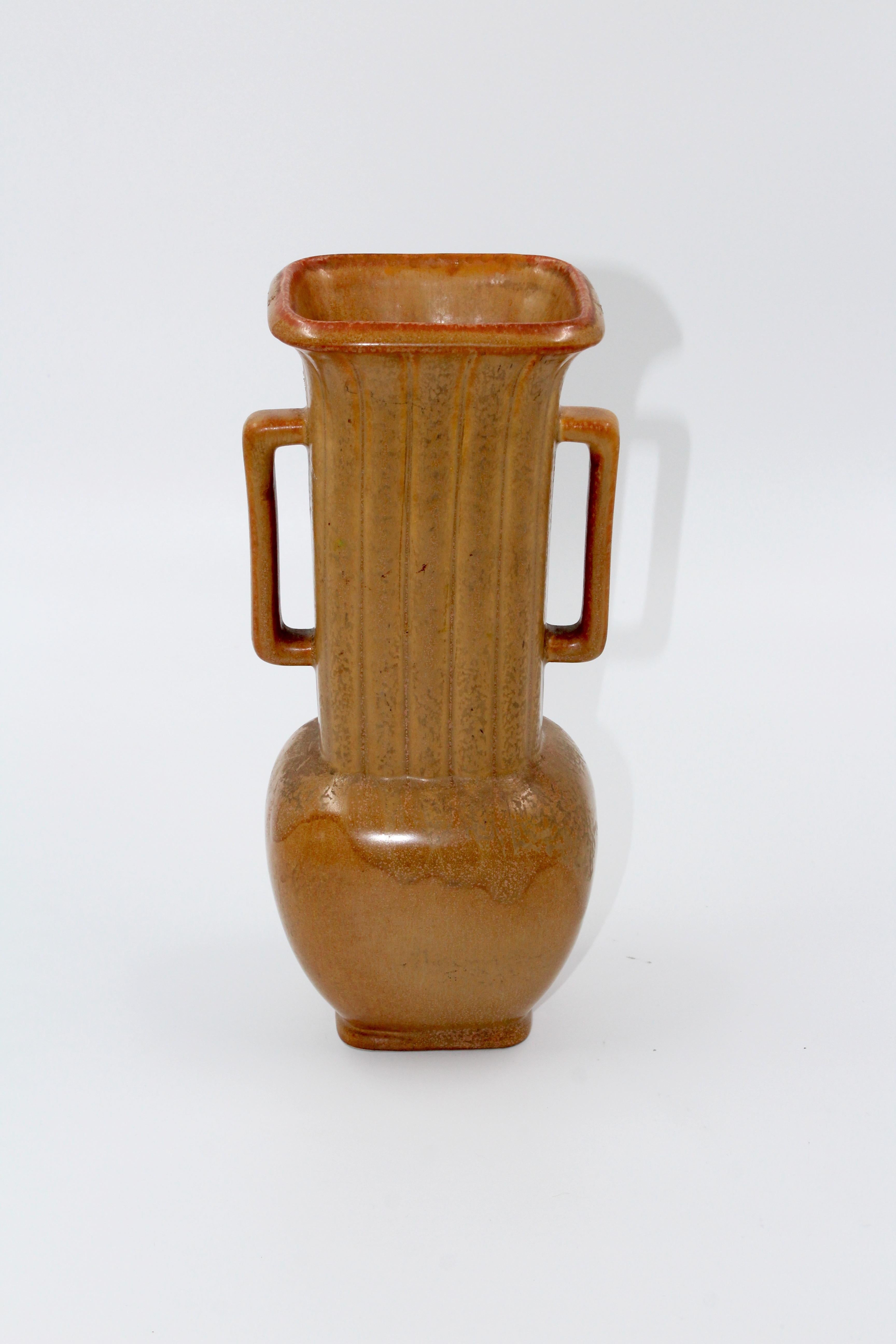 A large ceramic vase designed by Swedish Potter Gunnar Nylund in the 1950s and was manufactured by Rörstrand. The vase is in very good vintage condition.