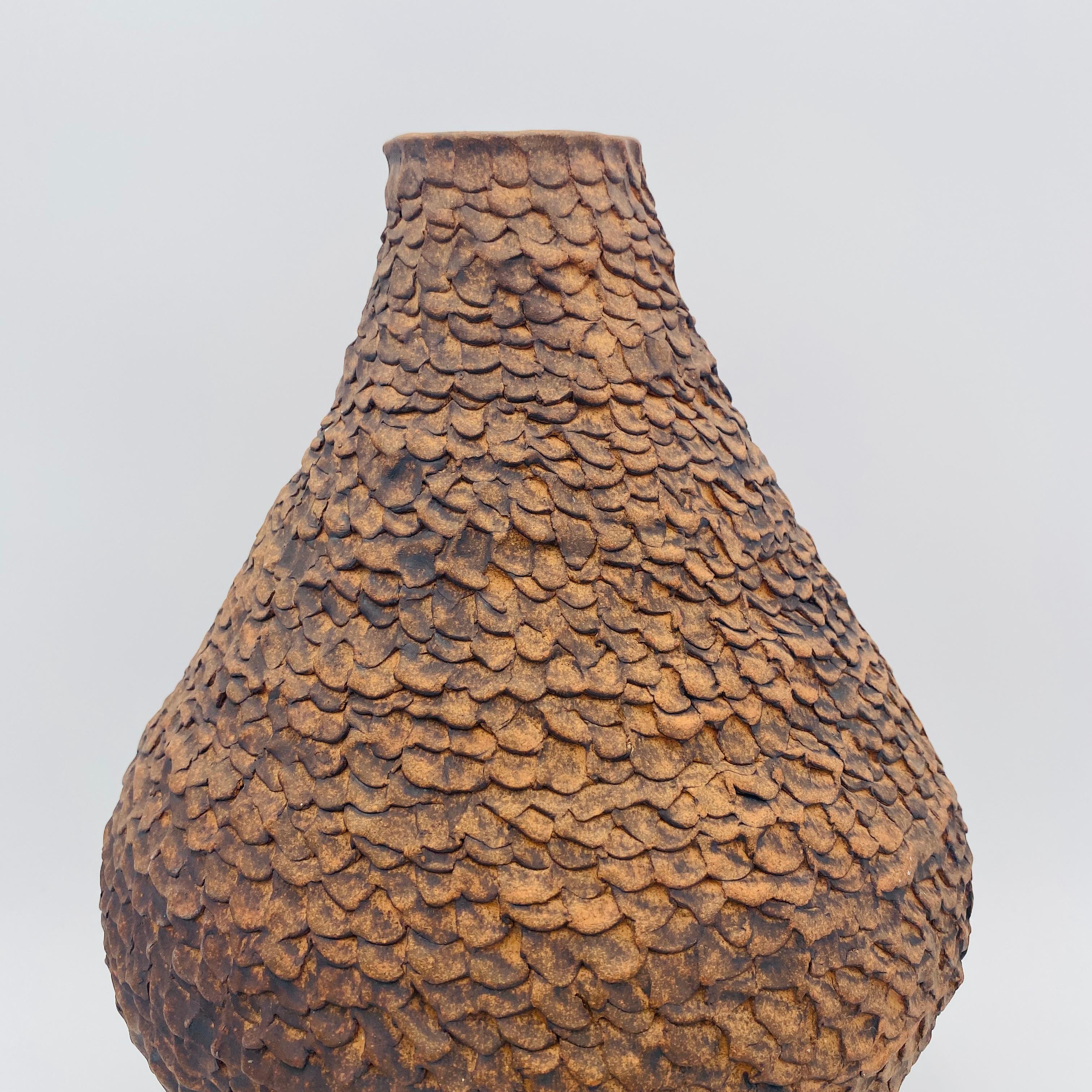 Incredible mid-century vase representing California studio pottery handmade circa the 1960s. The bottom is signed “EJ.” 