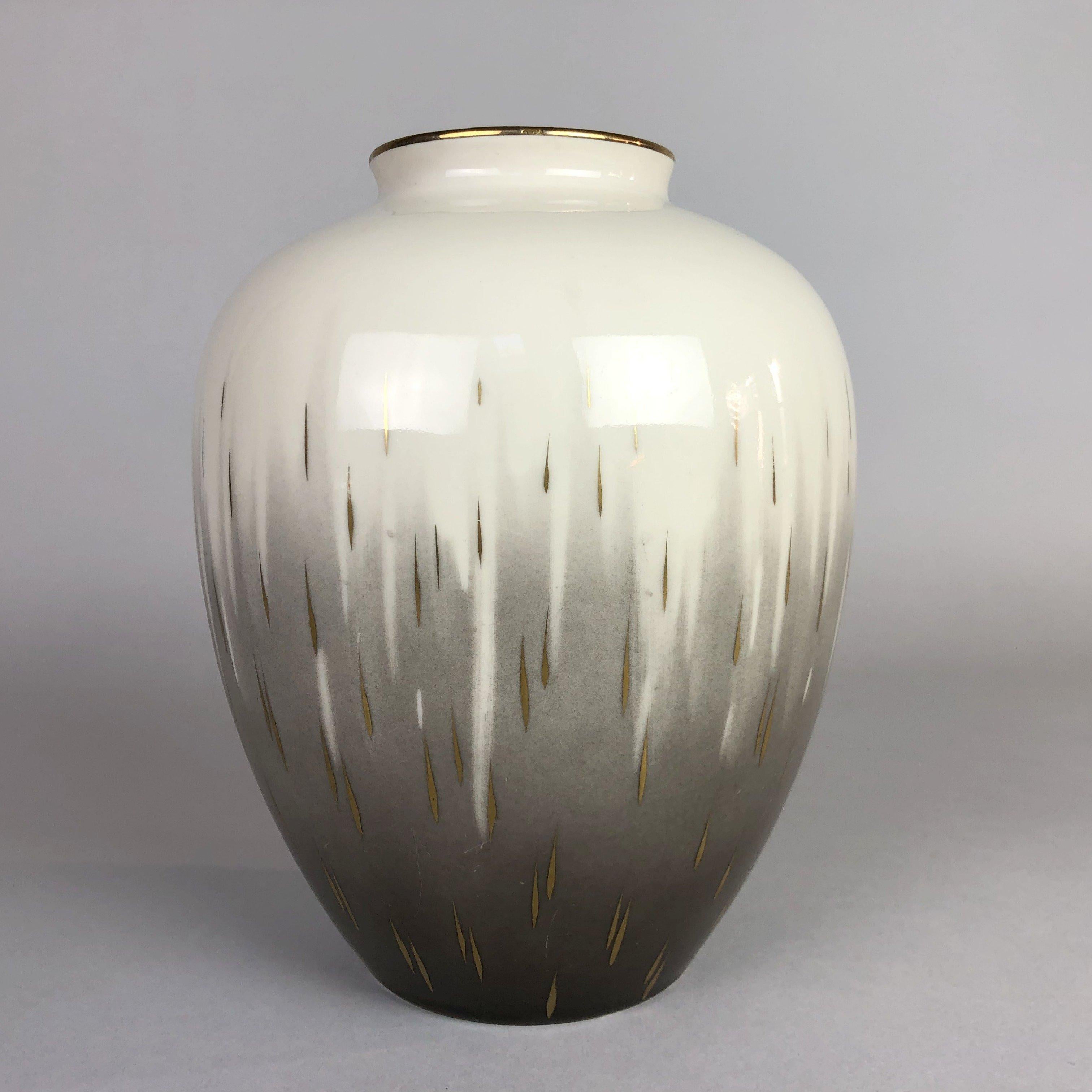 Beautiful vintage ceramic vase. White and grey colour with golden rim and other details, made by VEB Lichte in 1950's. Very good vintage condition with only slight signs of use.