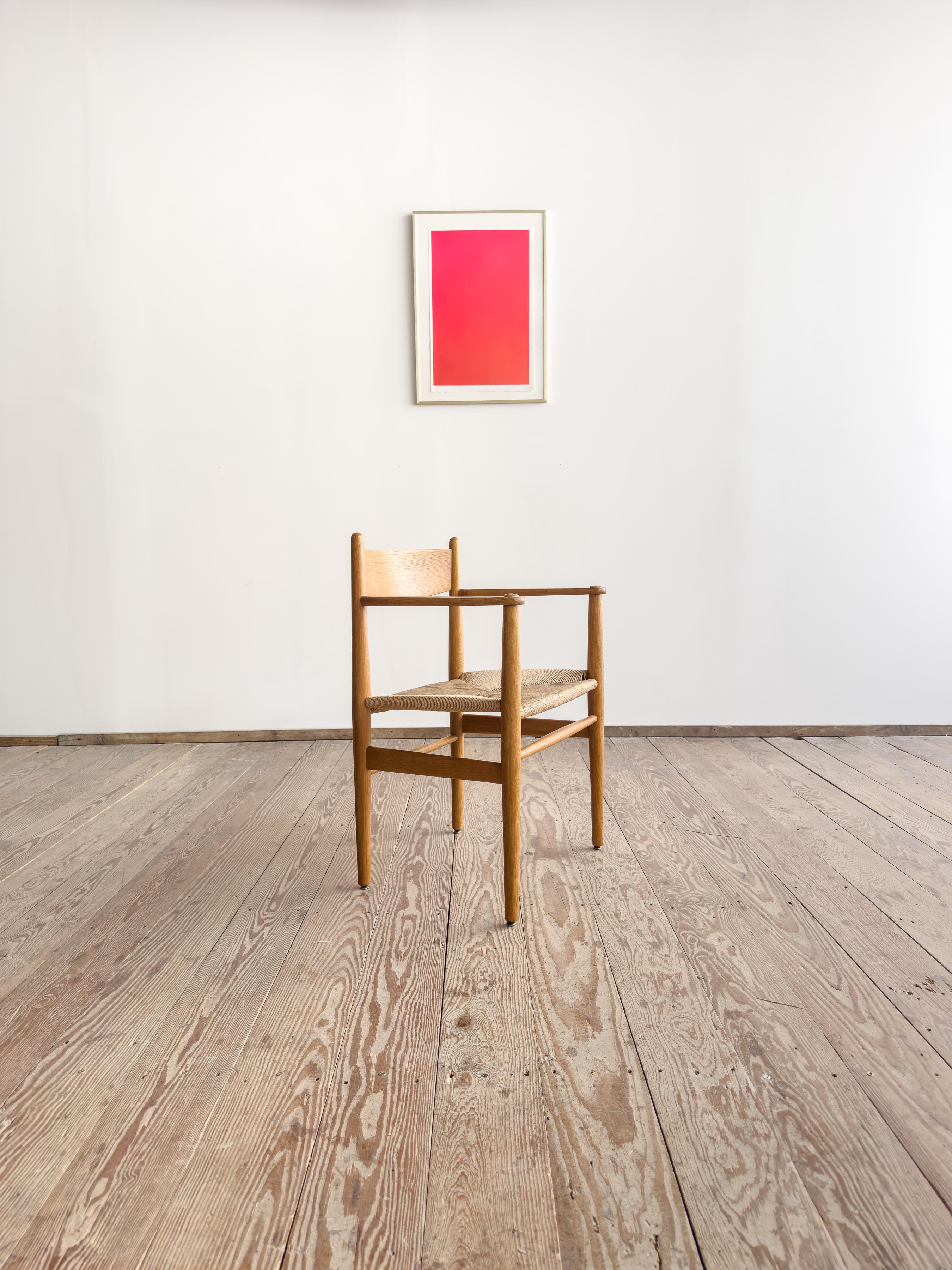 Dimensions: approx. 58 × 50 × 81 cm, seat height 45 cm, arm height 68 cm
(22.8 × 19.7 × 31.9 in; seat height: 17.7 in; arm height: 26.8 in)

Original CH37 armchair by Hans J. Wegner, designed in 1962 and crafted in Denmark – part of his iconic CH