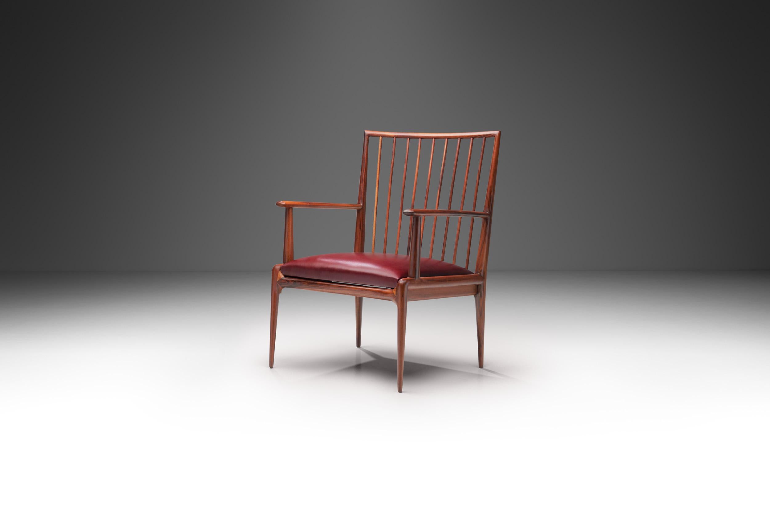 Ce rare fauteuil brésilien du milieu du siècle est attribué au collectif de designers Branco et Preto. Fabriqués de manière rationnelle et géométrique, ils présentent légèreté et simplicité.

Cette chaise est sculptée dans du bois brésilien de façon