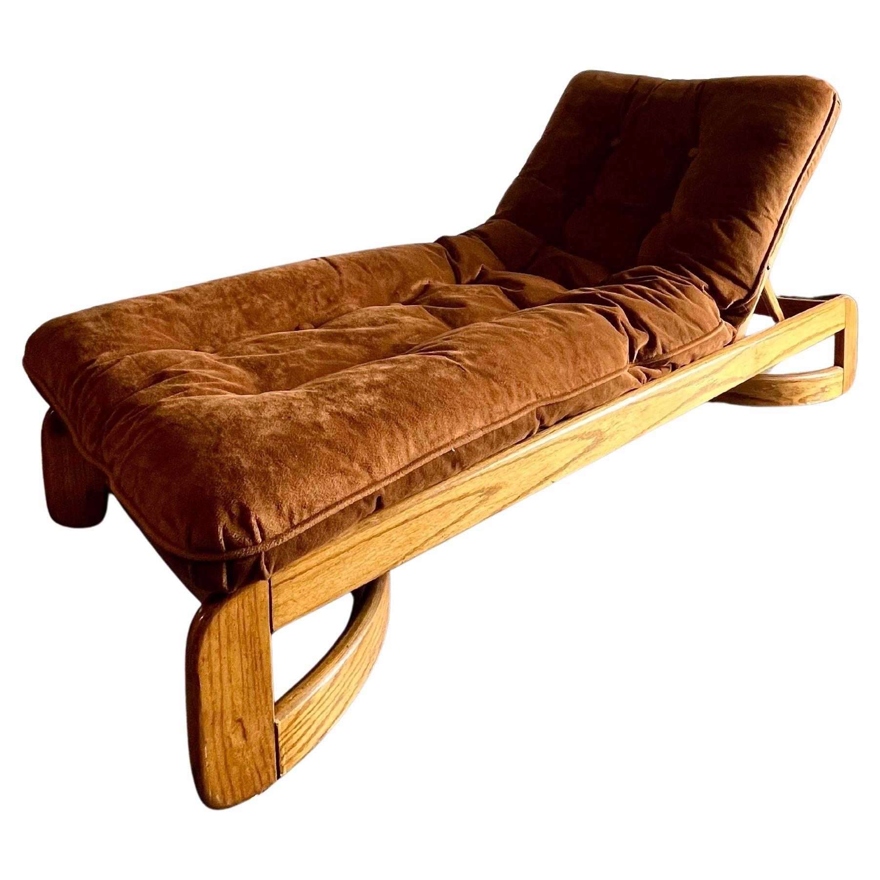 Incredibly versatile indoor chaise lounge by Howard Furniture. This particular line by Howard is crafted solid oak. This is the old growth, American grown, American made, with hearty craftsmanship and keen styling. What makes this line so special is
