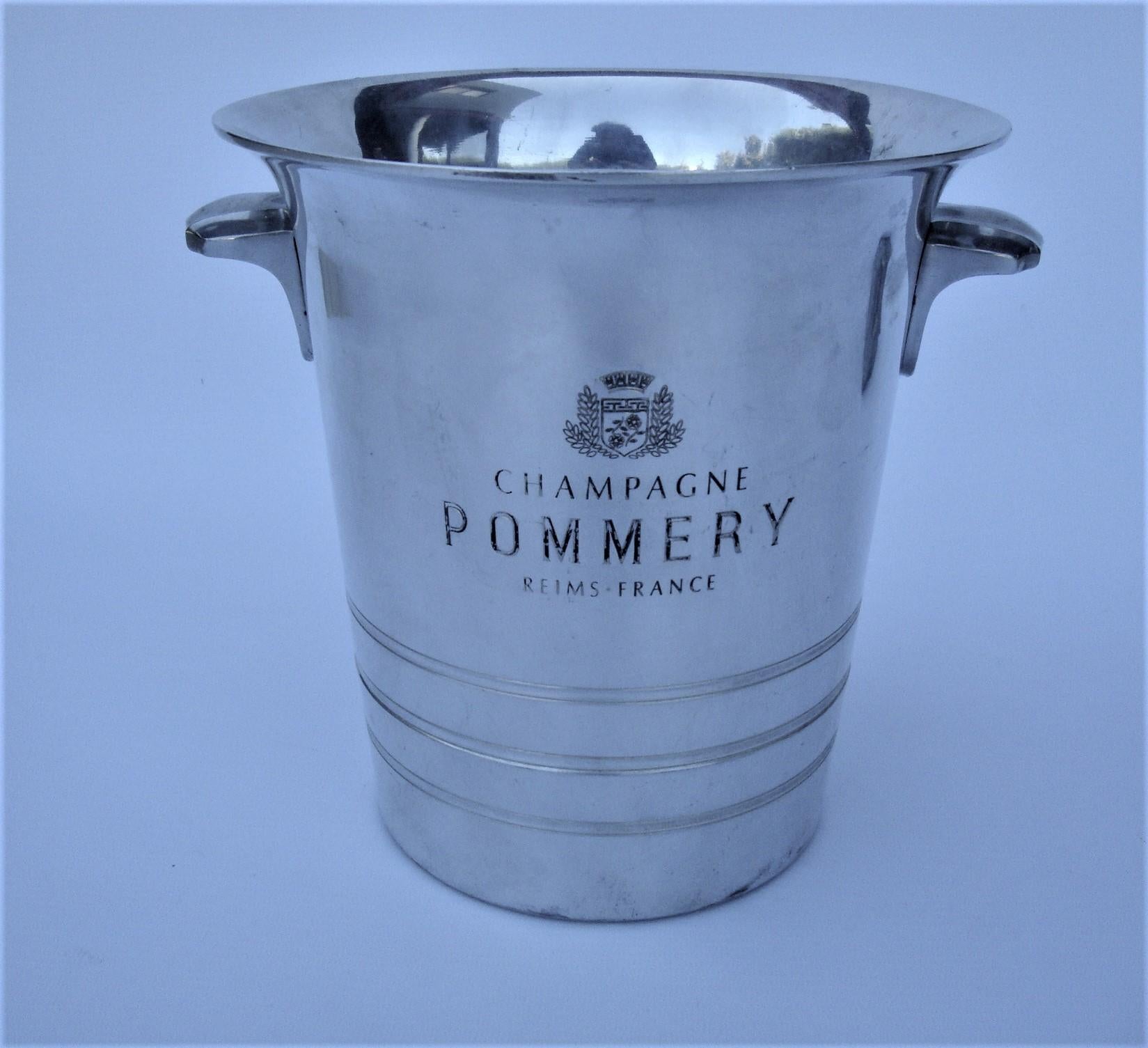 Art Deco - Mid-Century French Champagne / Ice Cooler bucket, embossed with the logo of Pommery Champagne is a wonderful piece of advertising memorabilia and a gorgeous addition to your bar or table top. The 
There is a maker’s stamp on the reverse
