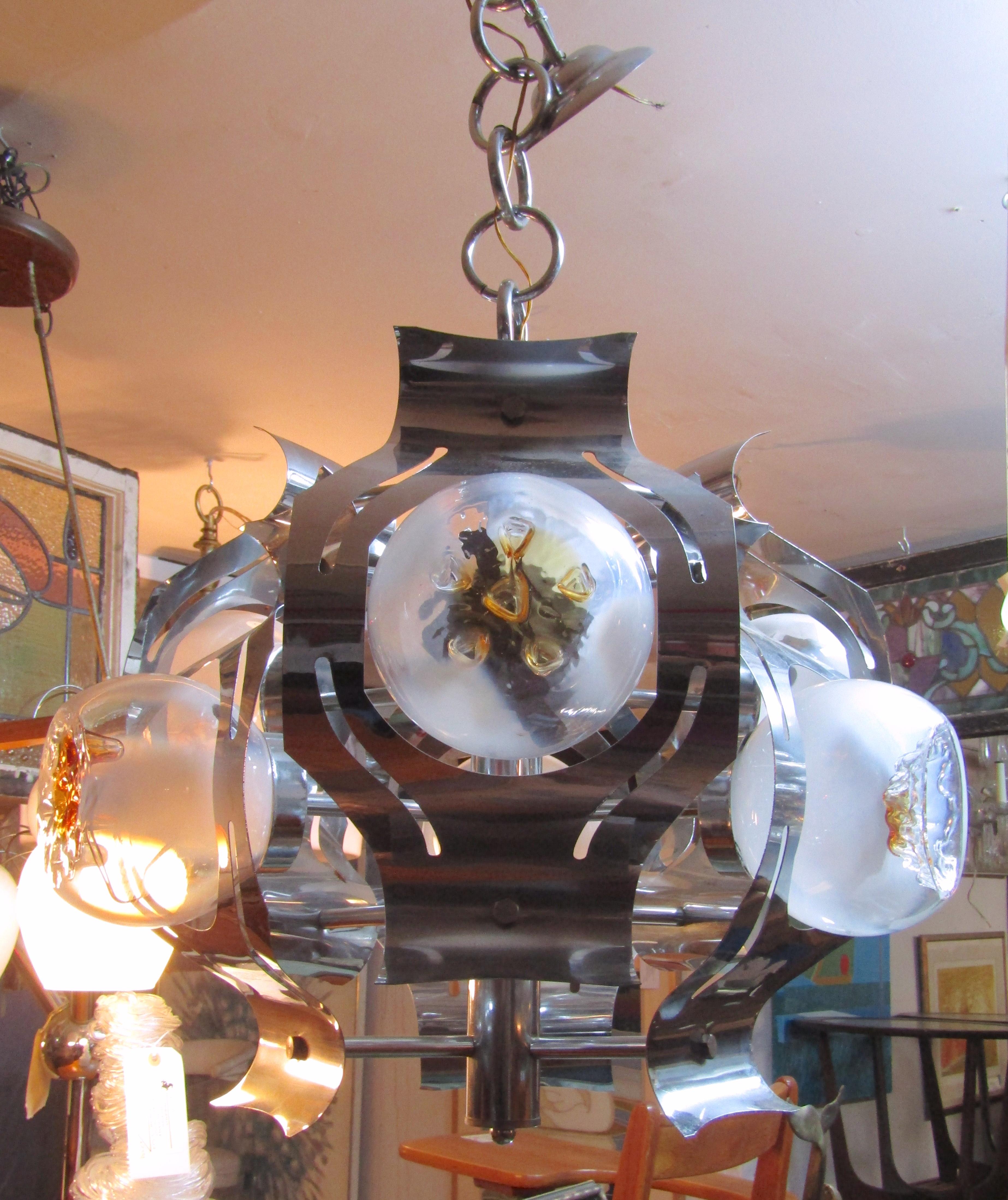 Vintage Italian chandelier with chrome frame and blown glass shades with amber color.
(Please confirm item location - NY or NJ - with dealer).
   
