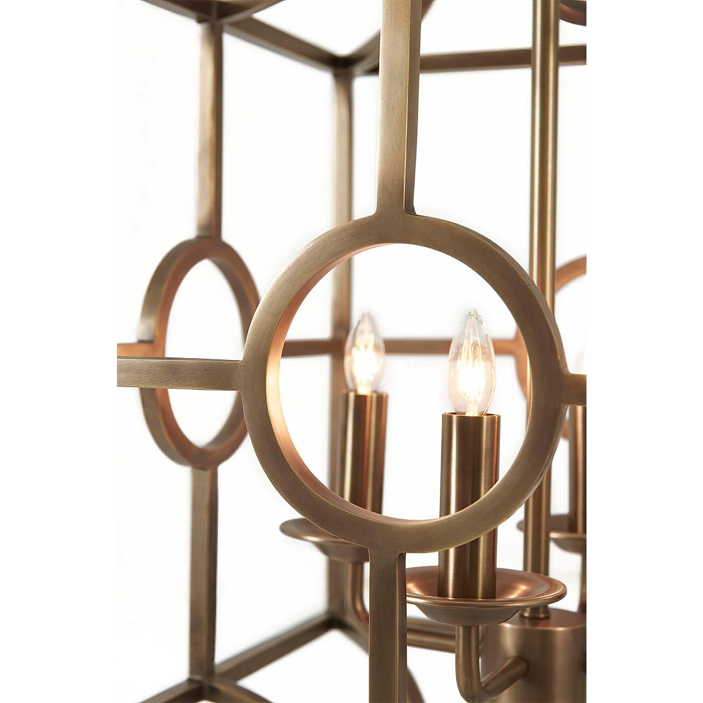 Midcentury style brass finished steel four-light lantern cage pagoda form chandelier.

Dimensions: 18
