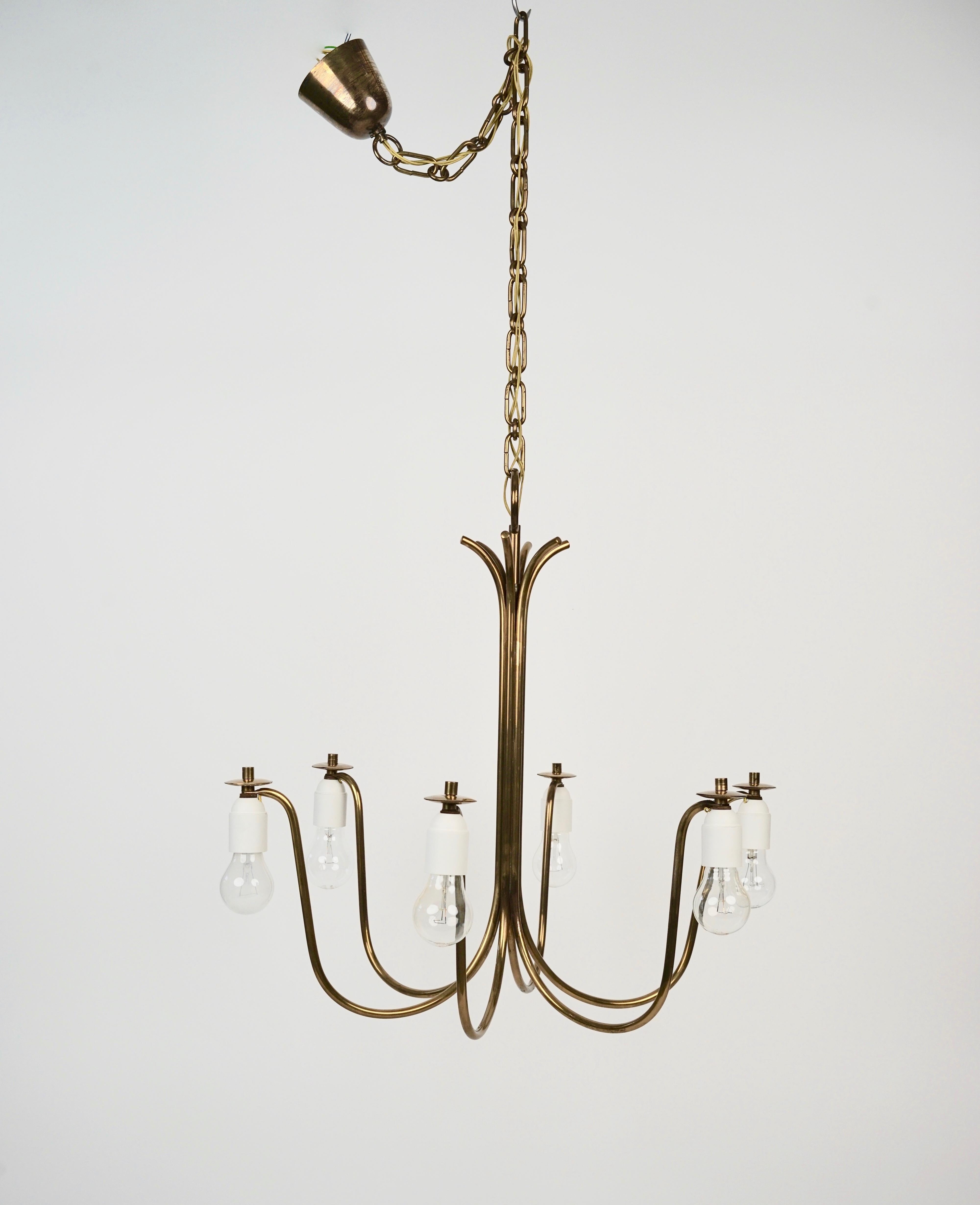 Large chandilier in brass with six arms, designed by Josef Frank in the 1950 ' s, Austria.
The silk shades in cream use the original metal construction. The electric has been controlled and has new sockets.