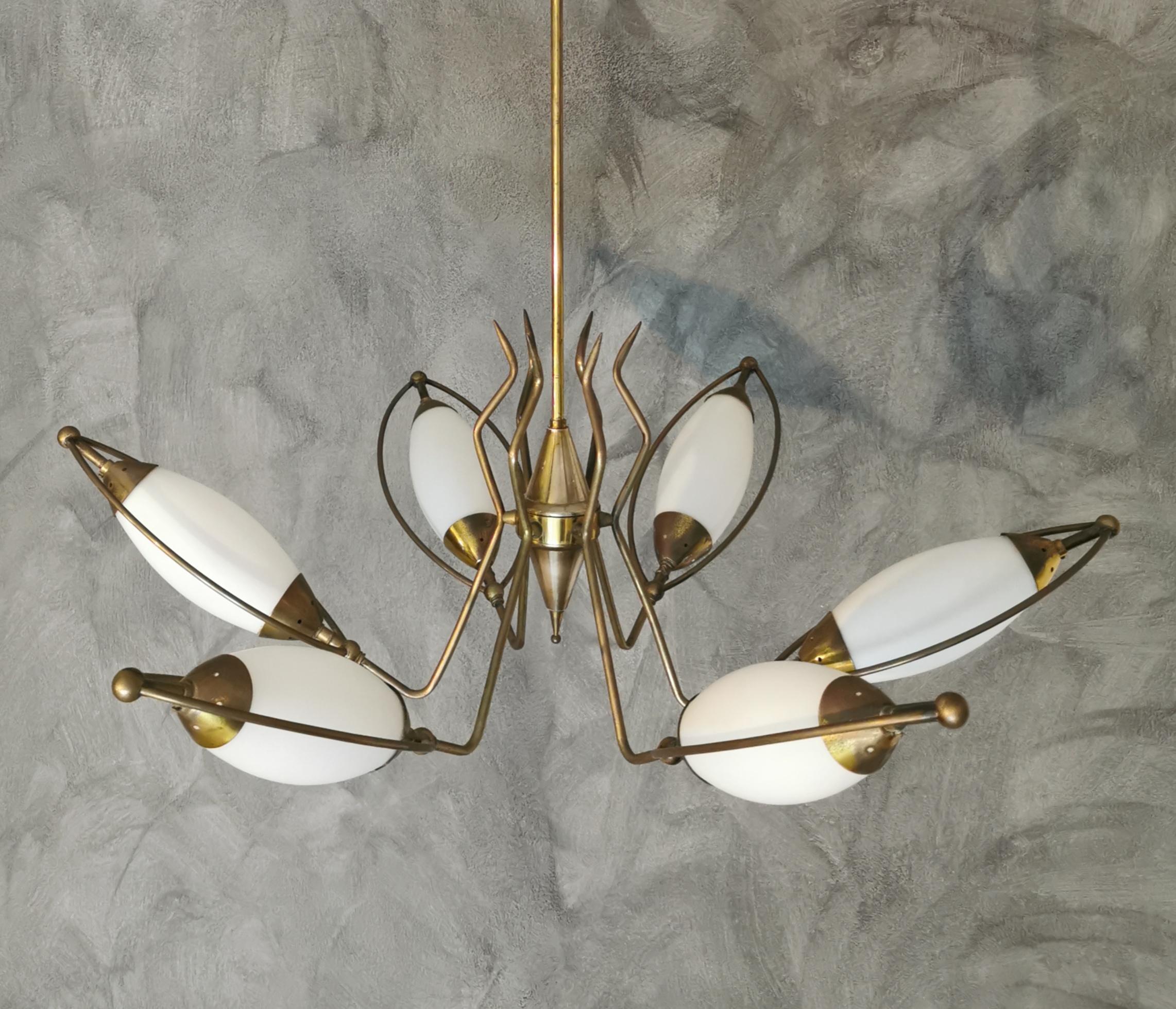 Chandelier in the style of Stilnovo at 6-light in brass in the shape of a spider, with opal glass. From the 1960s. Italian design.