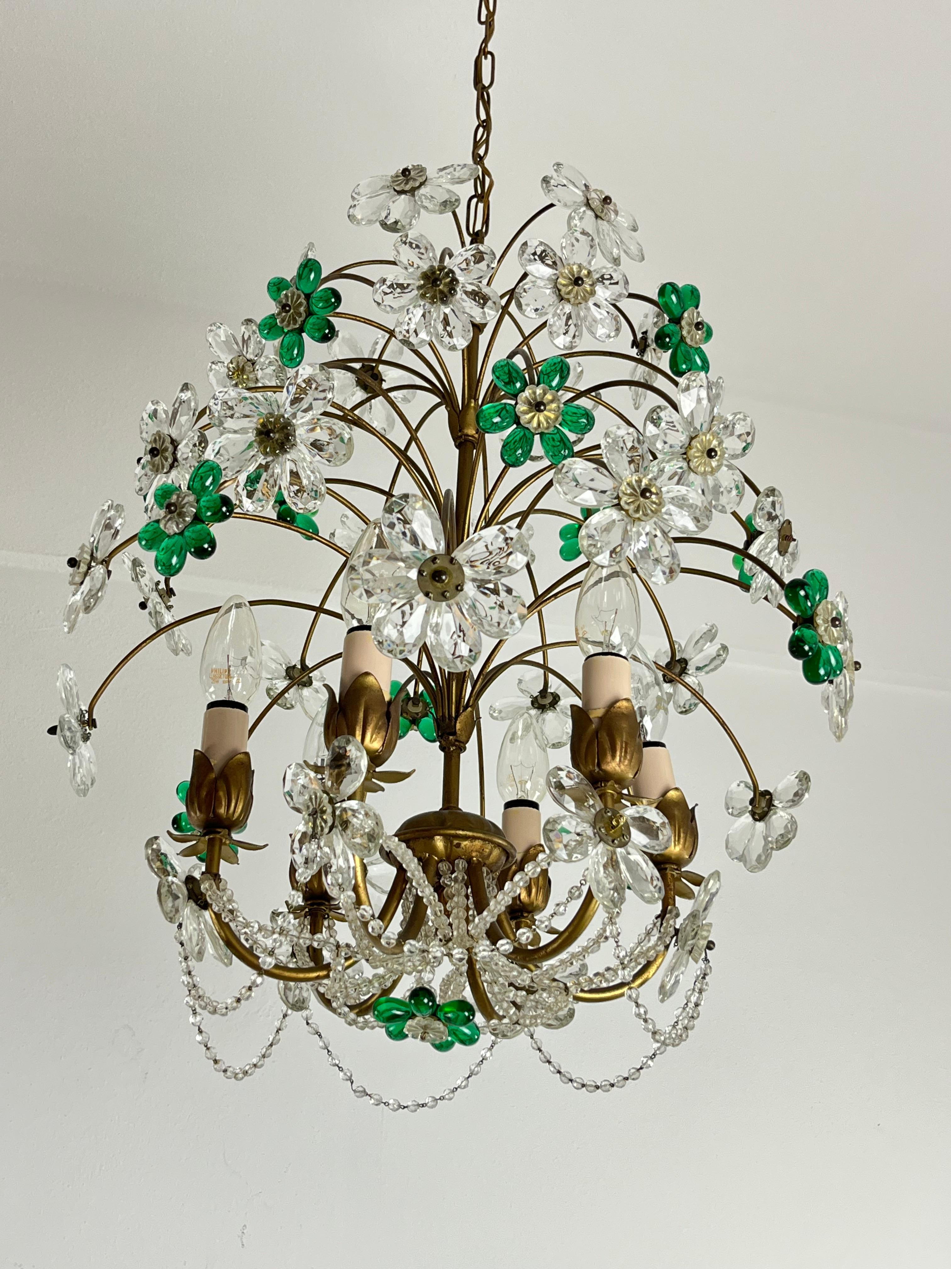 Mid-Century chandelier with colored and transparent flowers in Murano glass, 1960s
6-Lights, e14 lamps.
Intact and in good condition.
Golden metal structure.