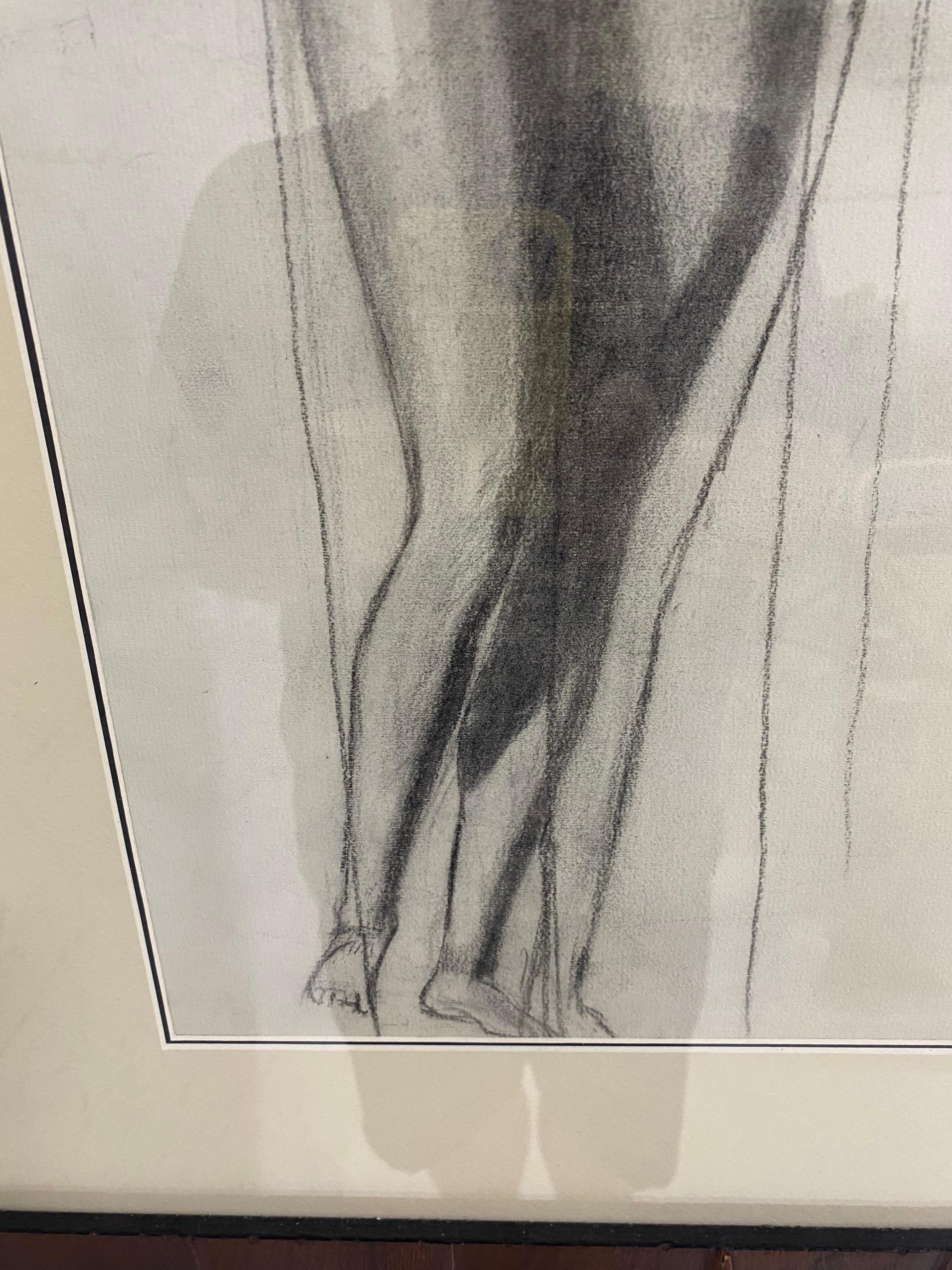 This is a mid 20th century charcoal on paper male nude study. This drawing is presented in a handmade Italian frame with cream and black mat boards. The charcoal drawing is a male nude and is the artist initial study. The drawing is American made