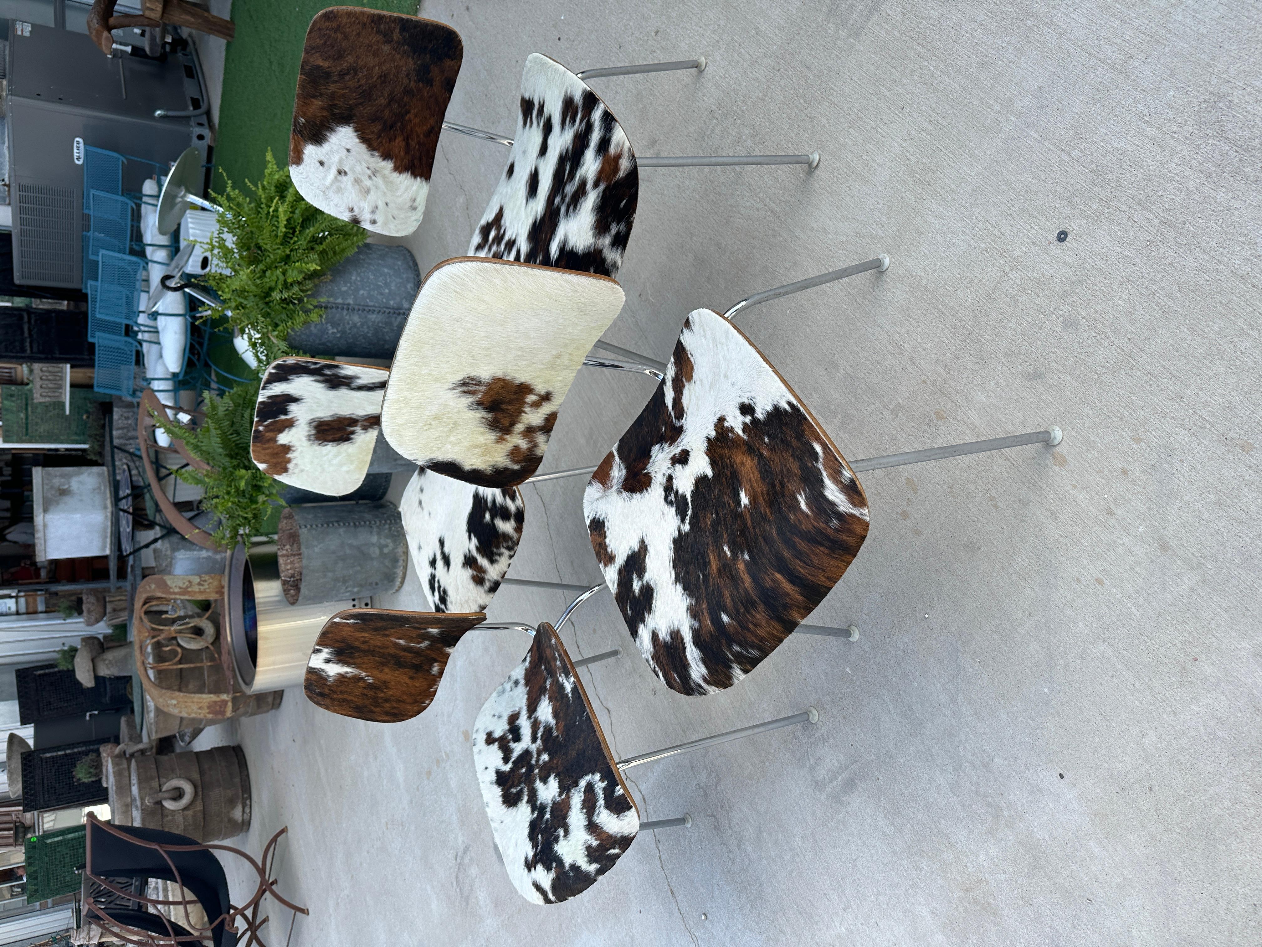 Mid- Century Charles and Ray Eames DCM Chairs in Original Cowhide, Set of Four 1