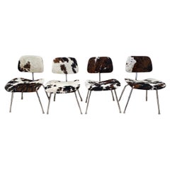 Mid- Century Charles and Ray Eames DCM Chairs in Original Cowhide, Set of Four