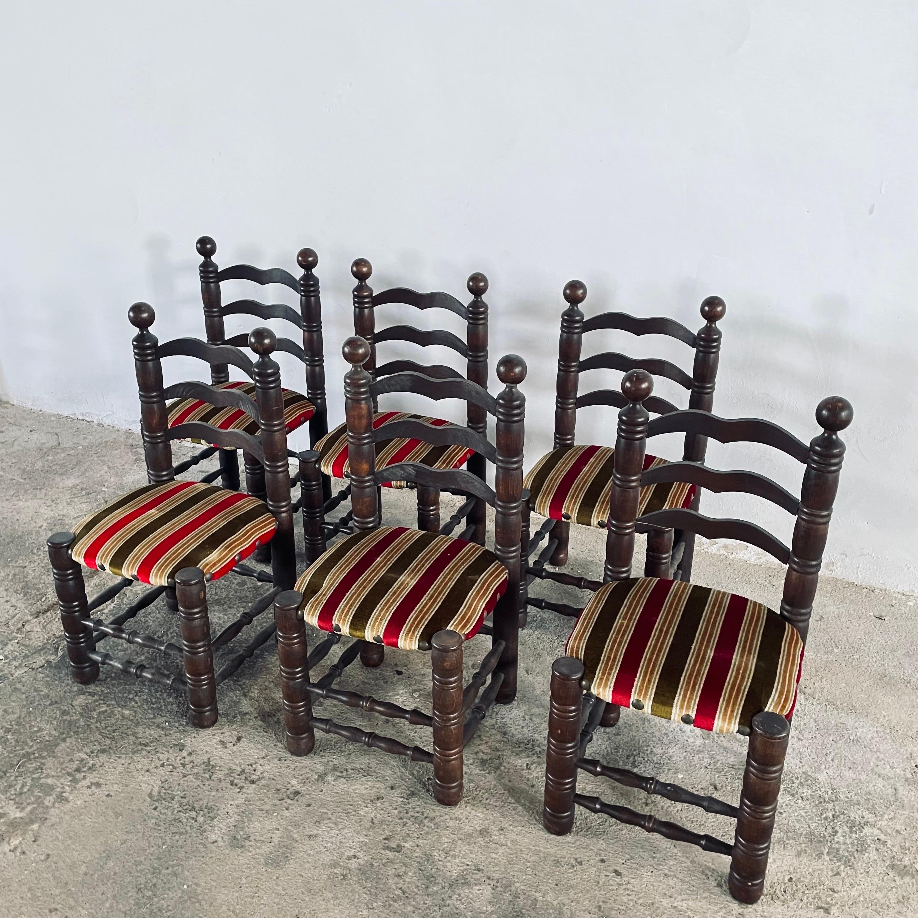 SET of 6, Vintage French Dining Ladder Back chairs in the Style of Charles Dudouyt, circa 1940s 
Natural and original heavy and sturdy oak frames with like new gorgeous era multi-color fabric
The style of the design is reminiscent of the designer