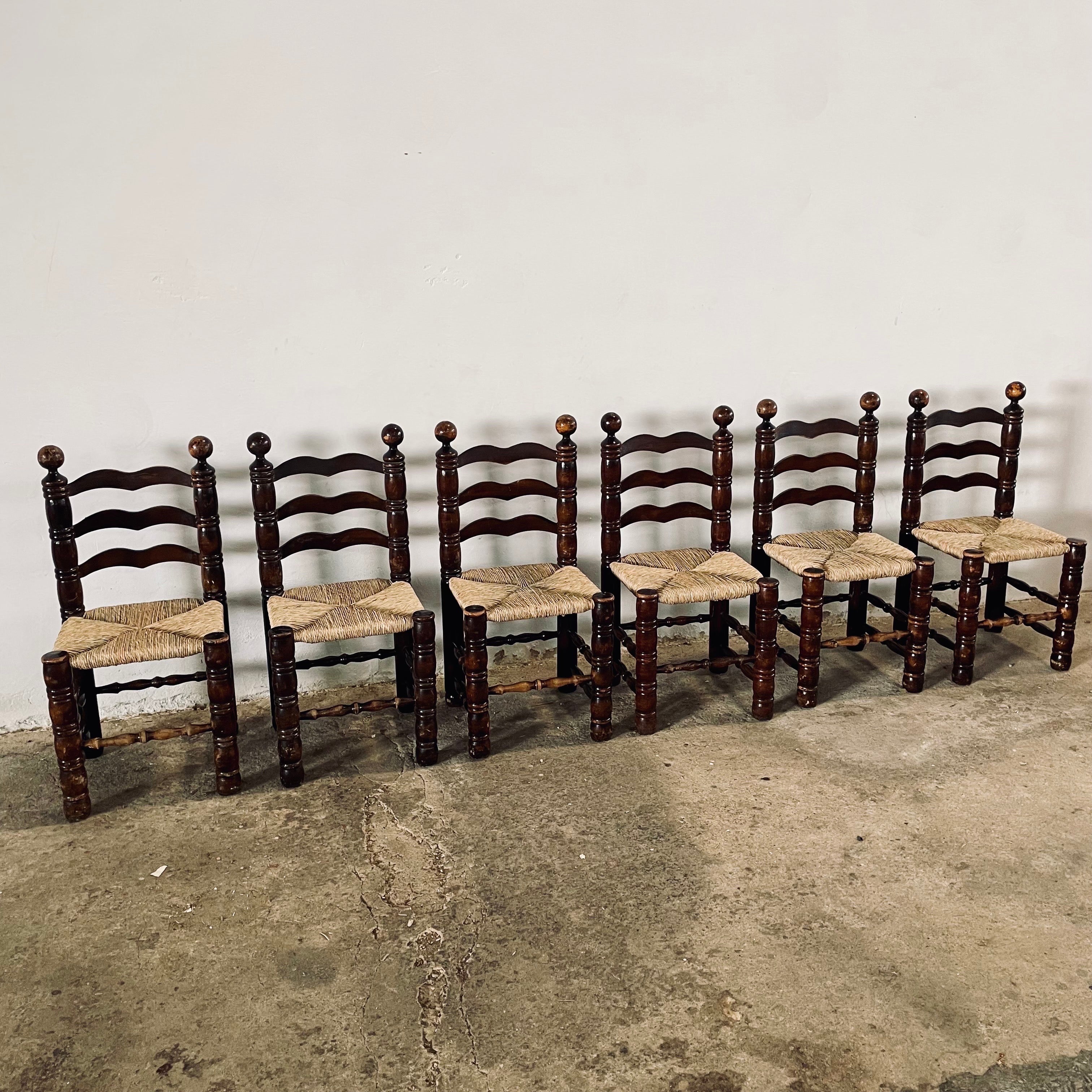 SET of 6, Vintage French Dining Ladder Back chairs in the Style of Charles Dudouyt, circa 1940s 
Natural and original heavy and sturdy oak frames with NEW hand-woven 5mm natural rush seats (natural anea).
The style of the design is reminiscent of