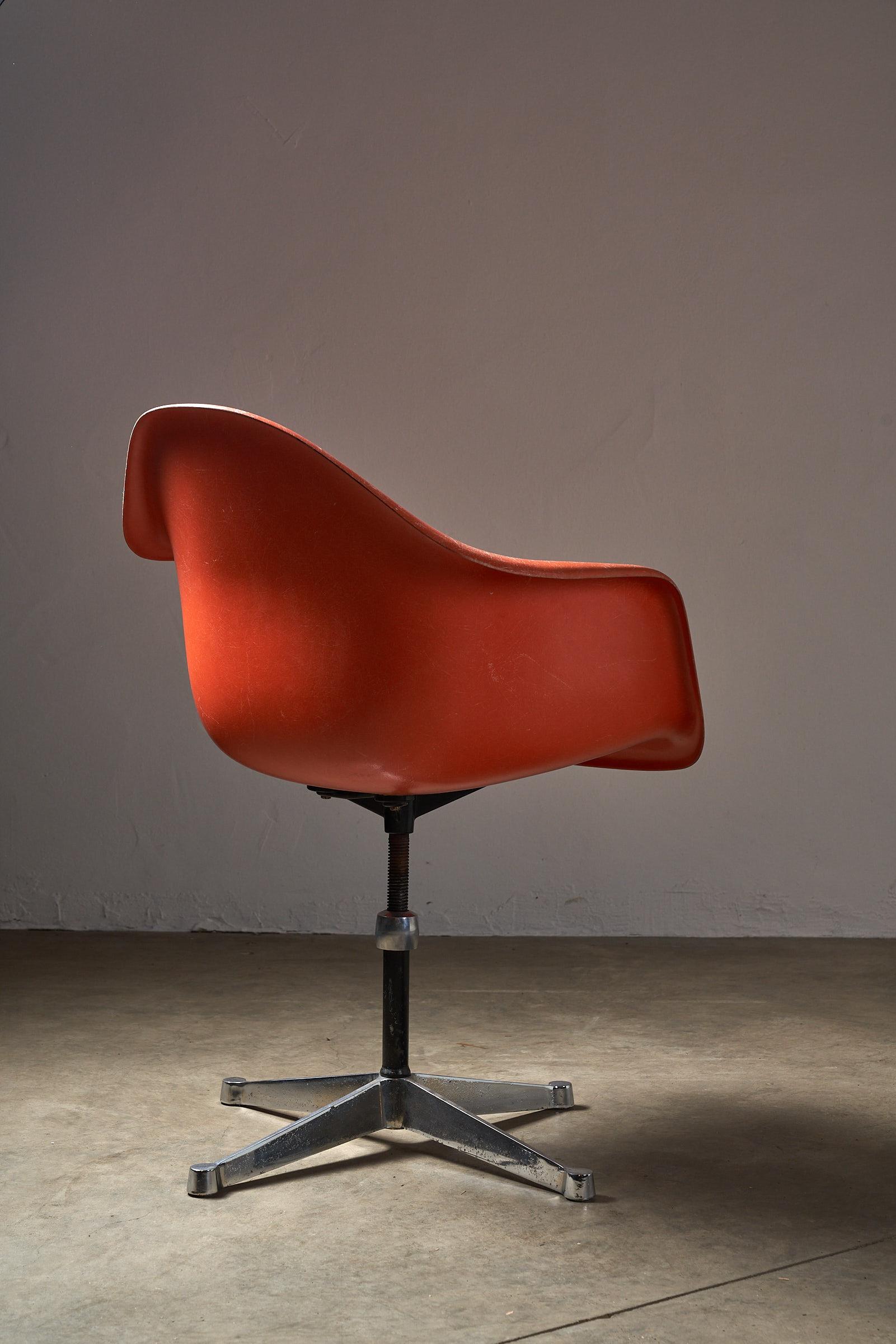 Hand-Crafted Mid-Century Charles Eames for Herman Miller Fiberglass Dining Chairs in Orange For Sale