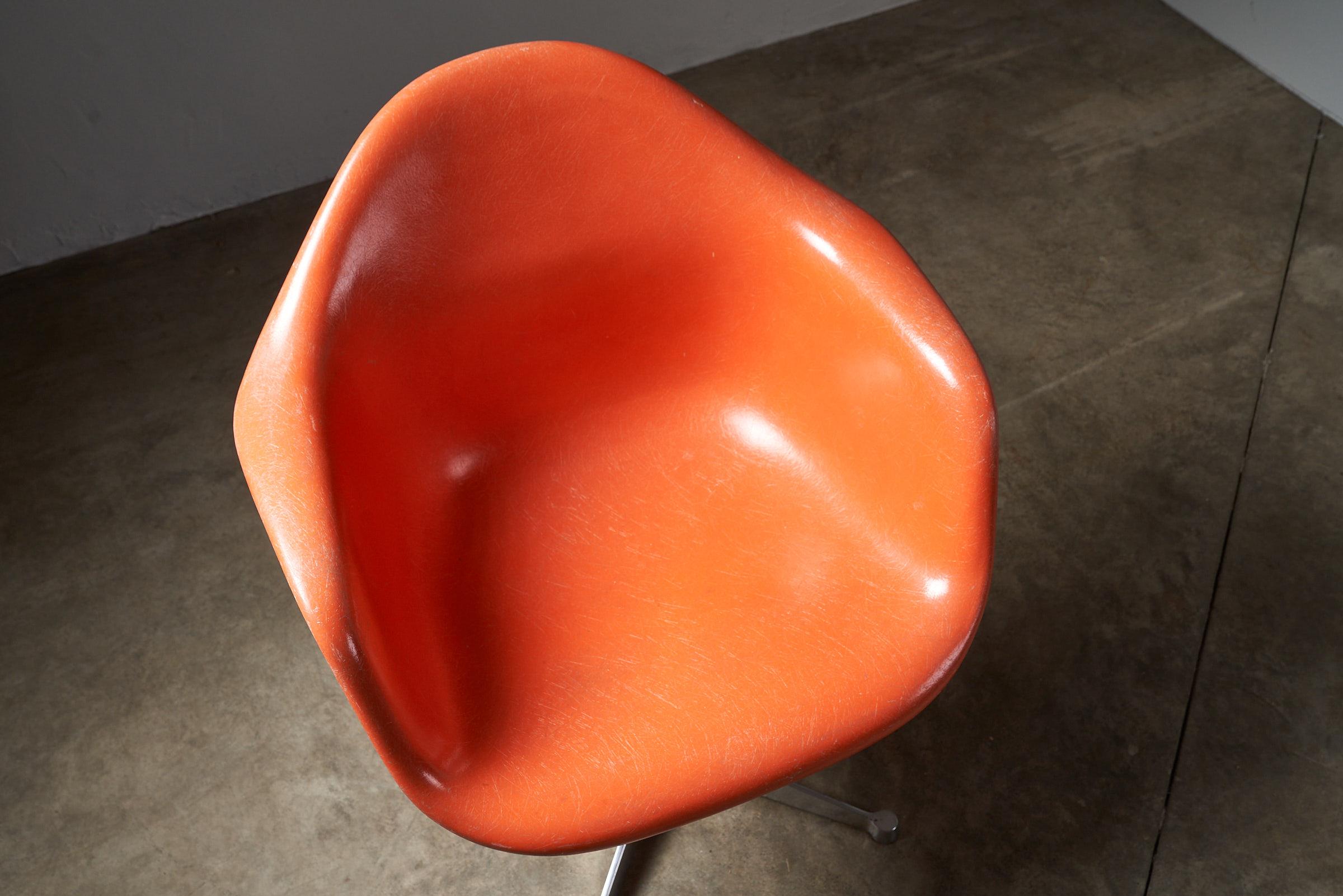 Metal Mid-Century Charles Eames for Herman Miller Fiberglass Dining Chairs in Orange For Sale