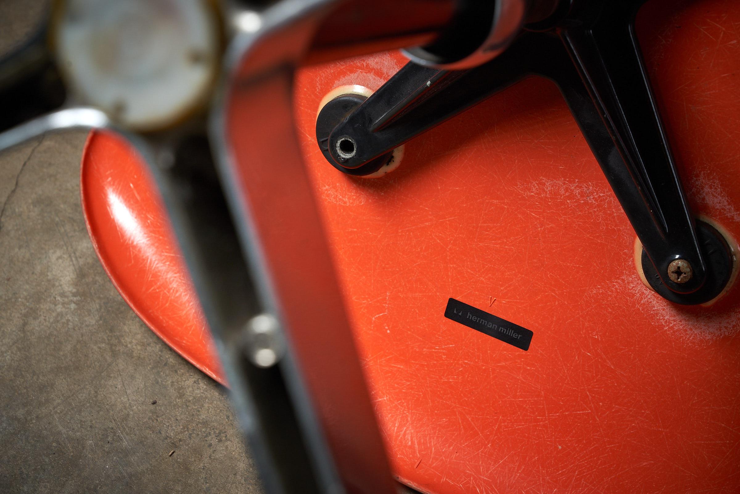 Mid-Century Charles Eames for Herman Miller Fiberglass Dining Chairs in Orange For Sale 1