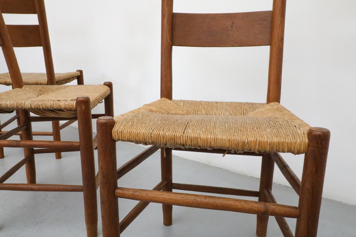 Mid-Century Modern Mid-Century Charlotte Perriand Inspired Dark Stained Oak and Rush Church Chairs