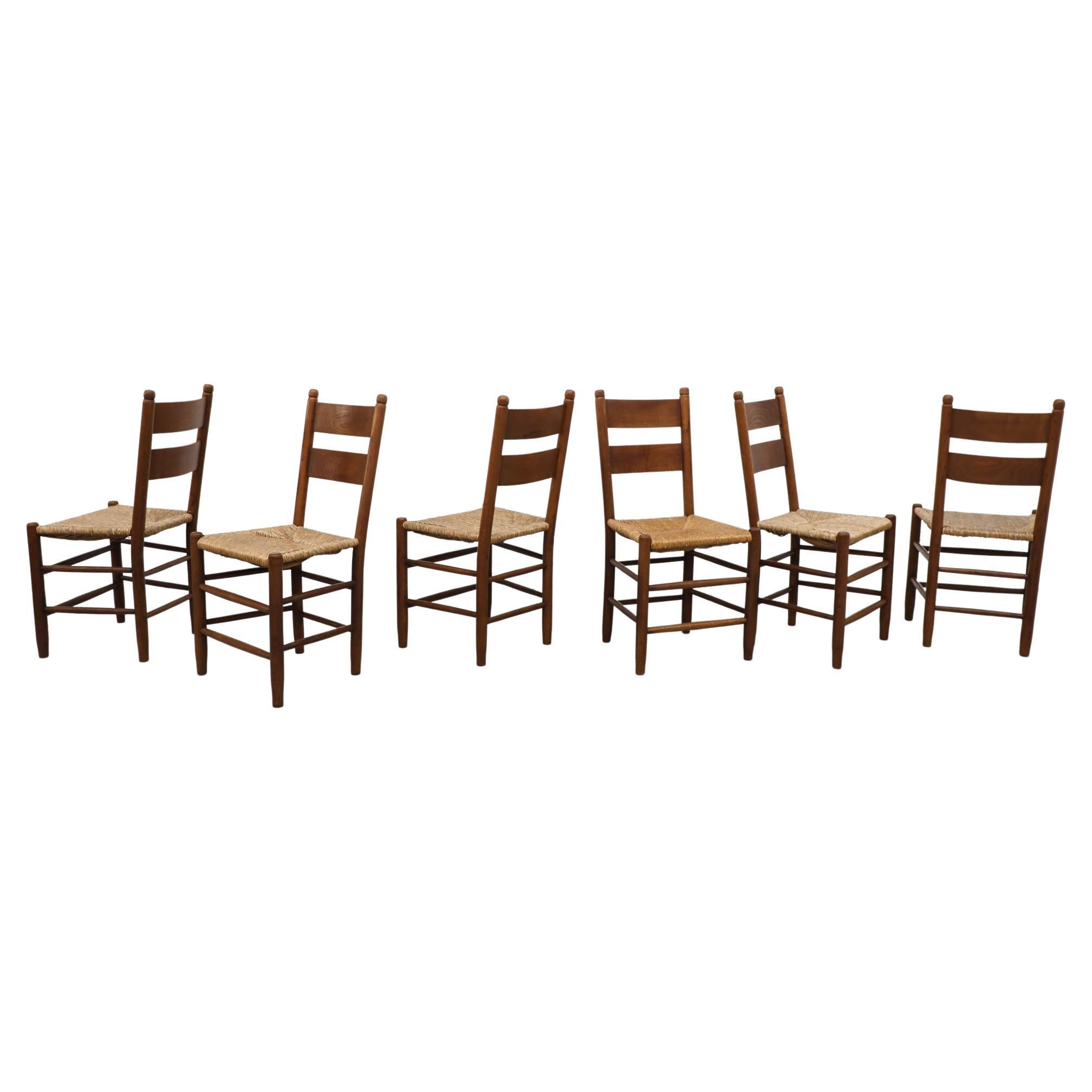 Mid-Century Charlotte Perriand Inspired Dark Stained Oak and Rush Church Chairs For Sale