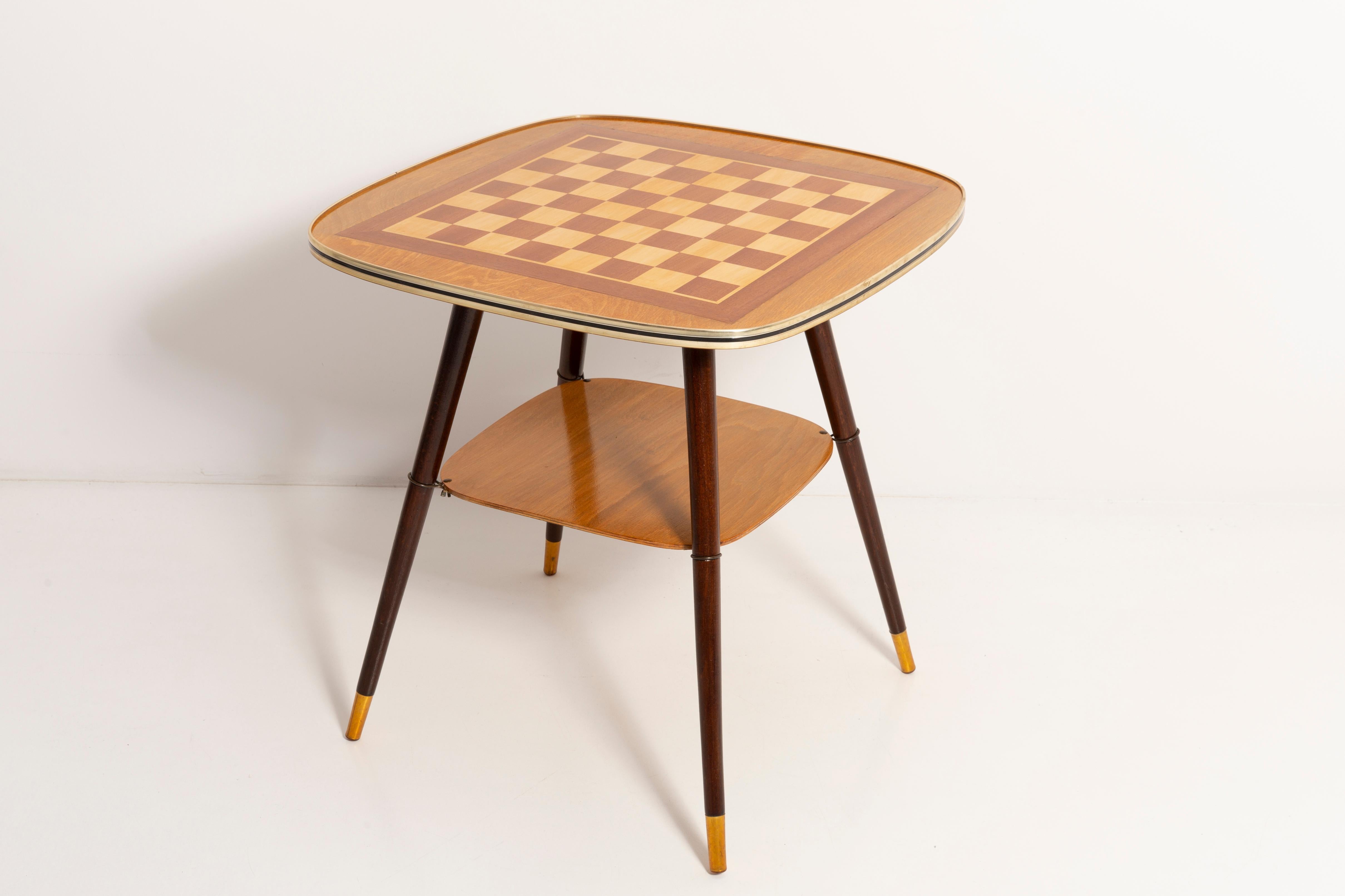 Beautiful antique chess table from the 1960s. It was manufactured in Poland in 1960s. The table was made of wood and veneer plywood, it was refreshed. Very good original vintage condition. Only one unique item.