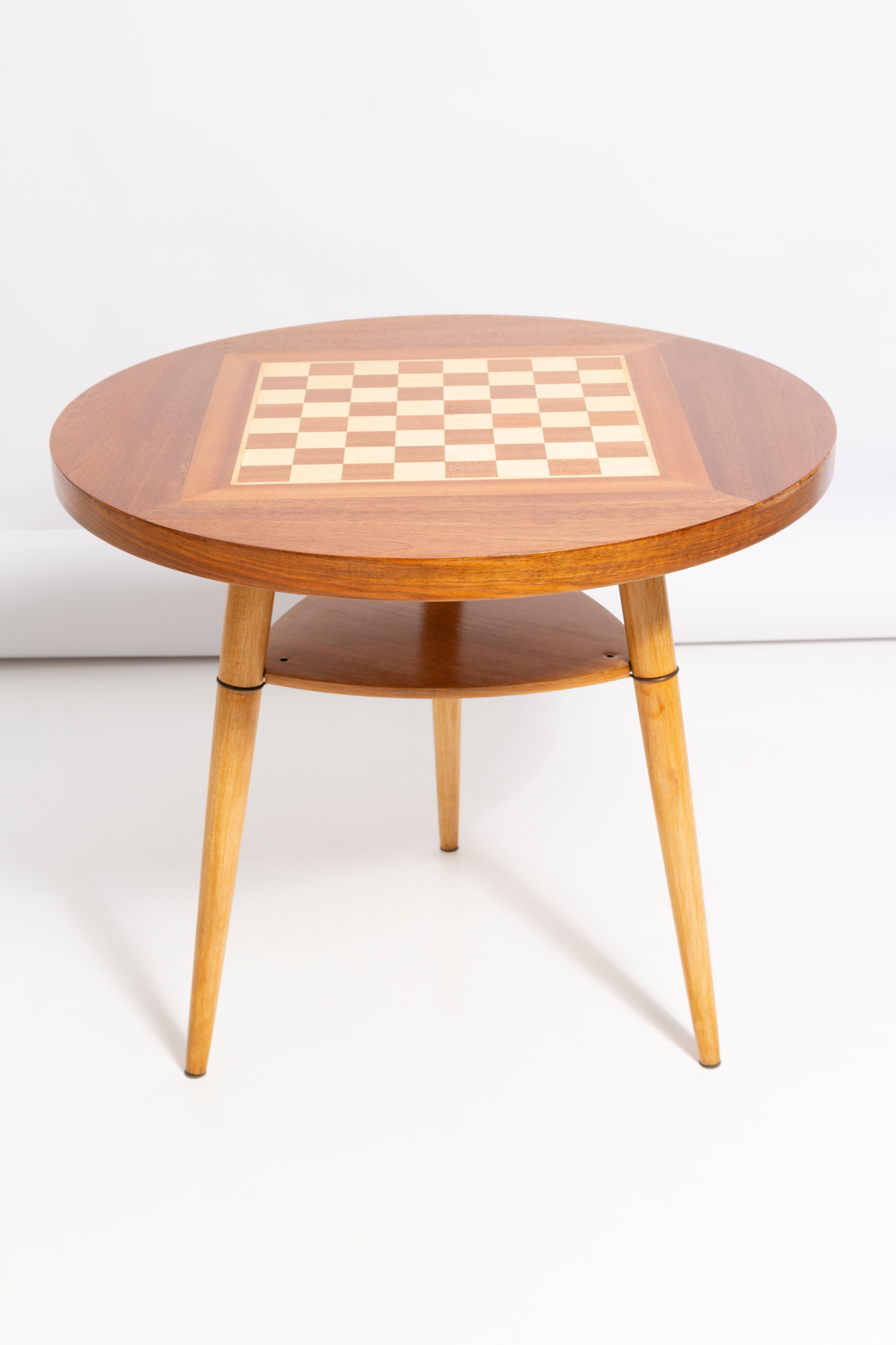 Beautiful antique chess table from the 1960s. It was manufactured in Poland in 1960s. The table was made of wood and veneer plywood, it was refreshed. Very good original vintage condition. Only one unique item.