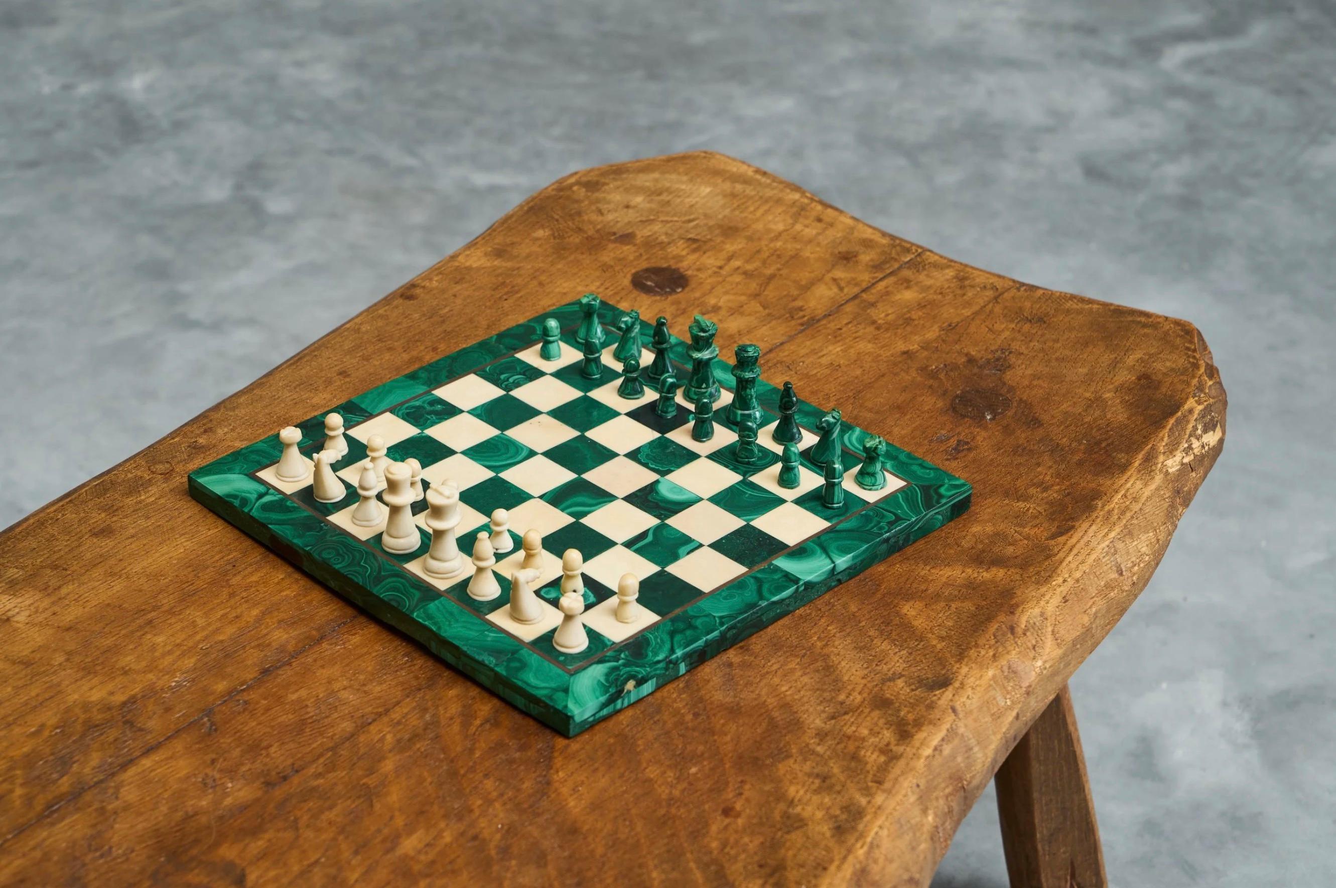 Mid Century Chess Set in Malachite and Brass 1960s

A stunning mid century chess set in malachite and inlaid brass. 

Wonderful contrast between the green and ivory colors - very expressive grain on the malachite. Just a stunning piece to enjoy or