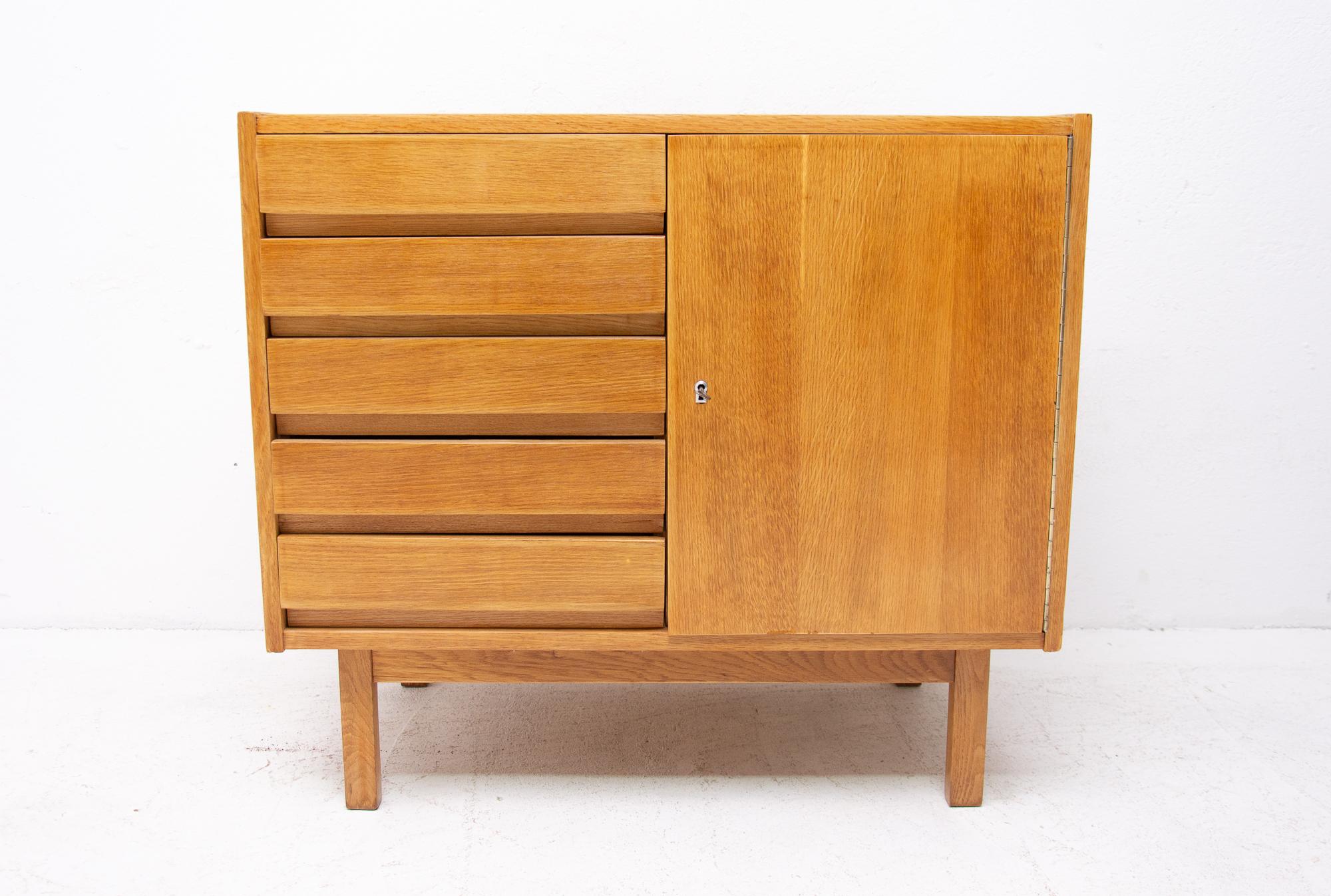 Midcentury chest of drawers, made in the former Czechoslovakia in the 1960s. This model is associated with the world-famous EXPO 58 in Brussels. It´s made of beechwood and plywood. The chest is in excellent condition, fully refurbished.