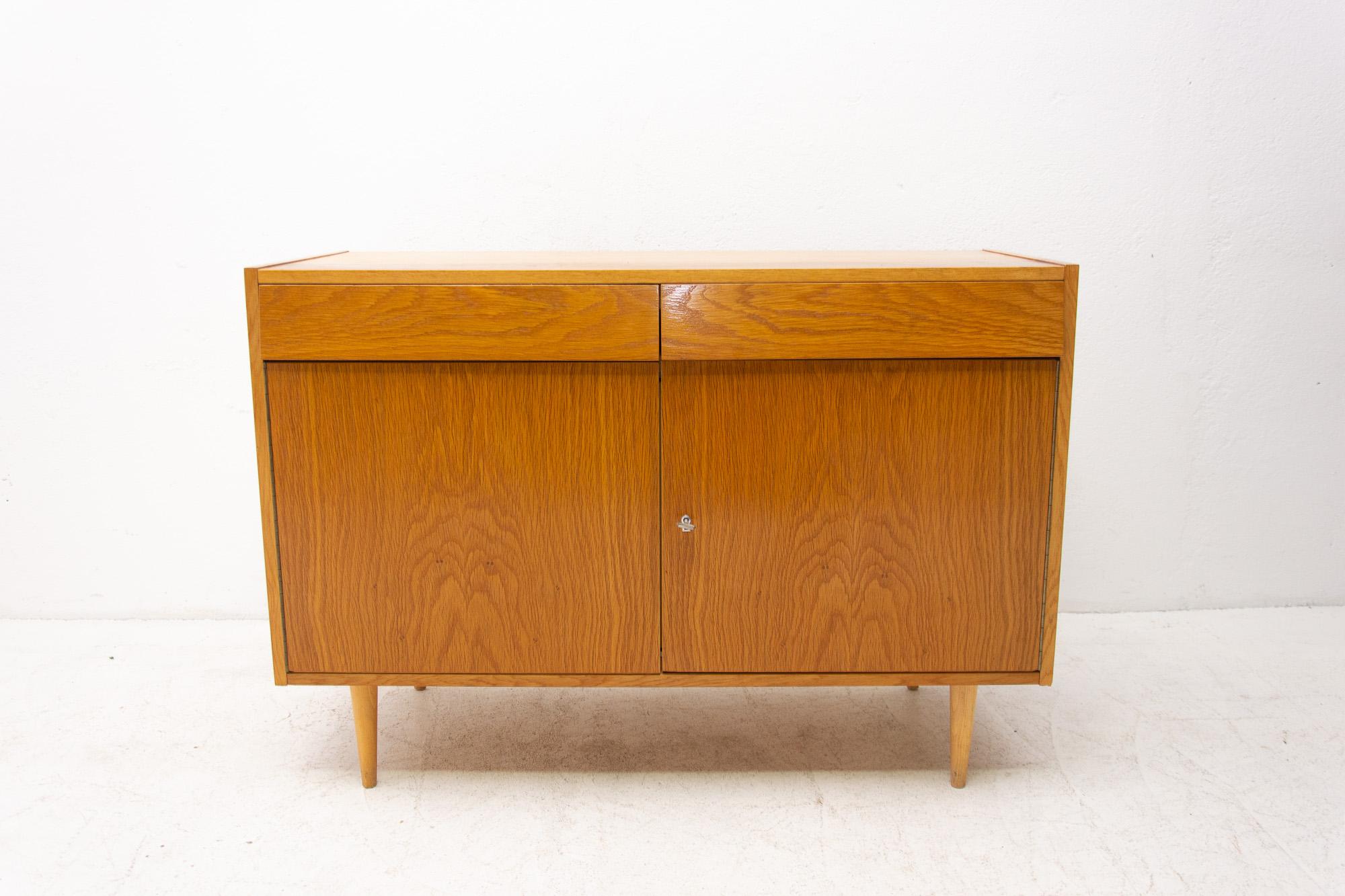 Midcentury chest of drawers, made in the former Czechoslovakia in the 1960s. This model is associated with the world-famous EXPO 58 in Brussels. It´s made of beech wood and plywood. The chest is in very good vintage condition, shows slight signs of
