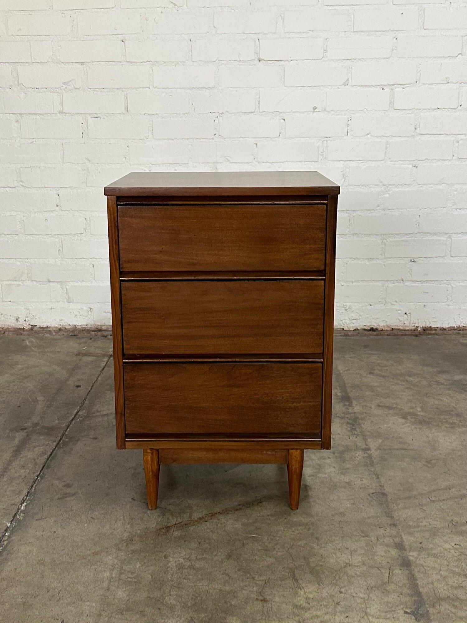 W20.5 D18 H31

Compact three drawer dresser in fully restored condition. Item is structurally sound and fully functional. This small dresser has hidden pulls underneath each drawer. 