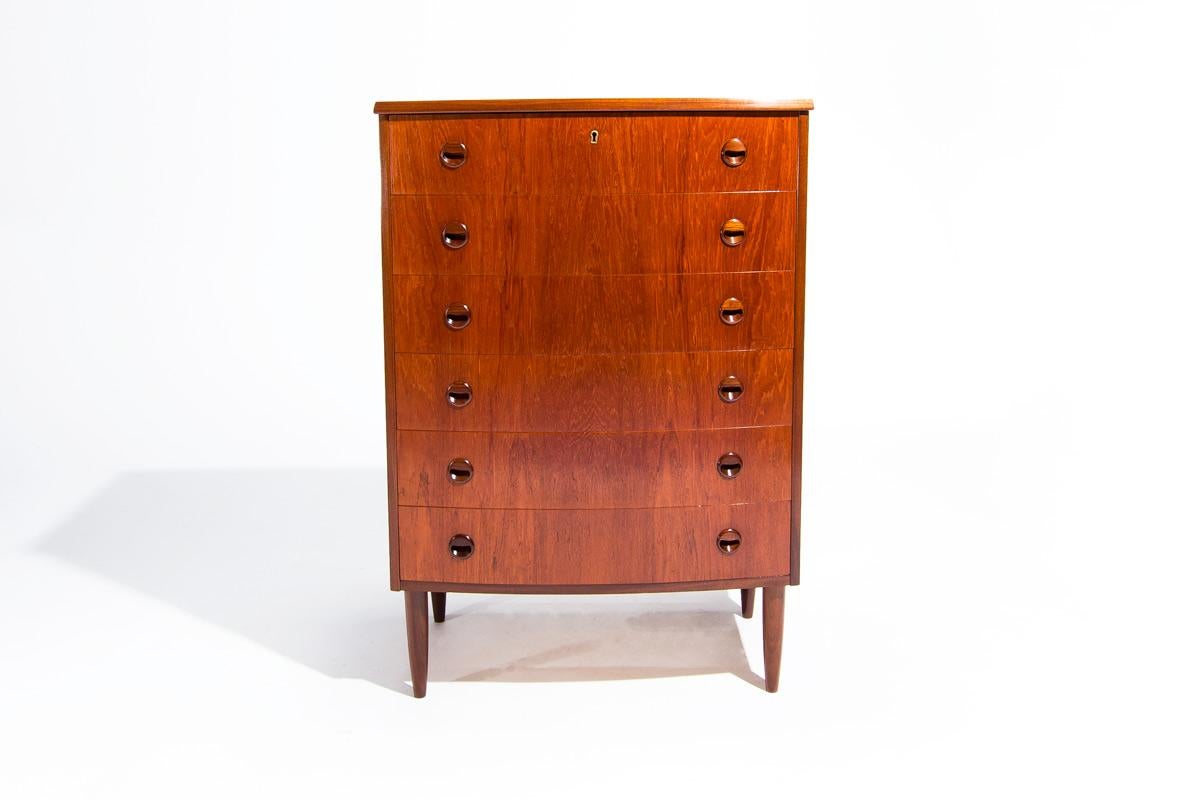 A lovely mid-century chest of drawers in teak by a Danish cabinetmaker in the 1960’s. A pretty design with nice attention to detail with the teak shaped draw handles this piece has a beautiful deep rich colour and patina which is naturally built up