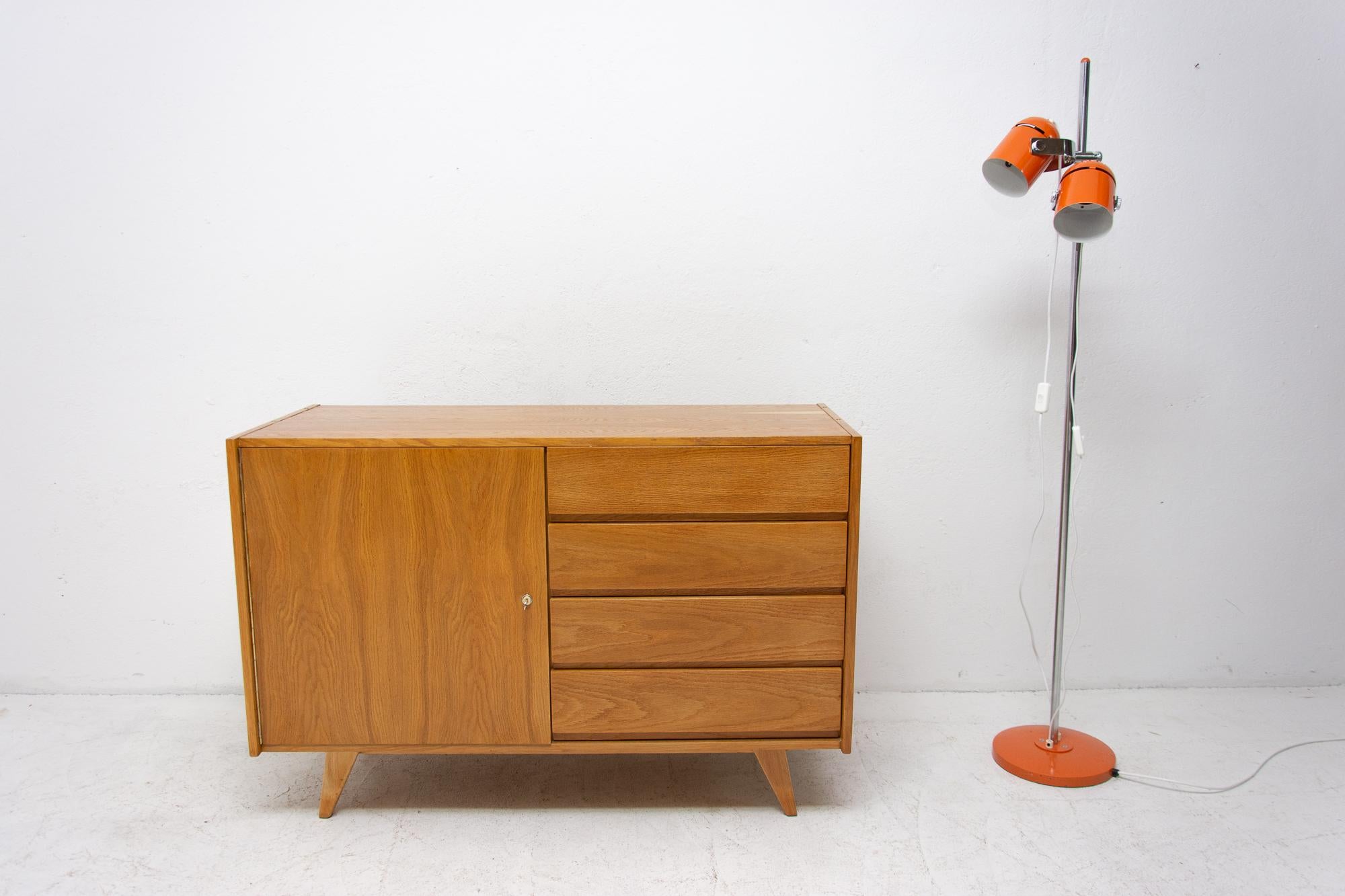 Midcentury chest of drawers, model no. U-458, designed by Jirí Jiroutek for Interiér Praha. It was made in the former Czechoslovakia in the 1960s. This model is associated with the world-famous EXPO 58 in Brussels. It´s made of oak wood and drawers