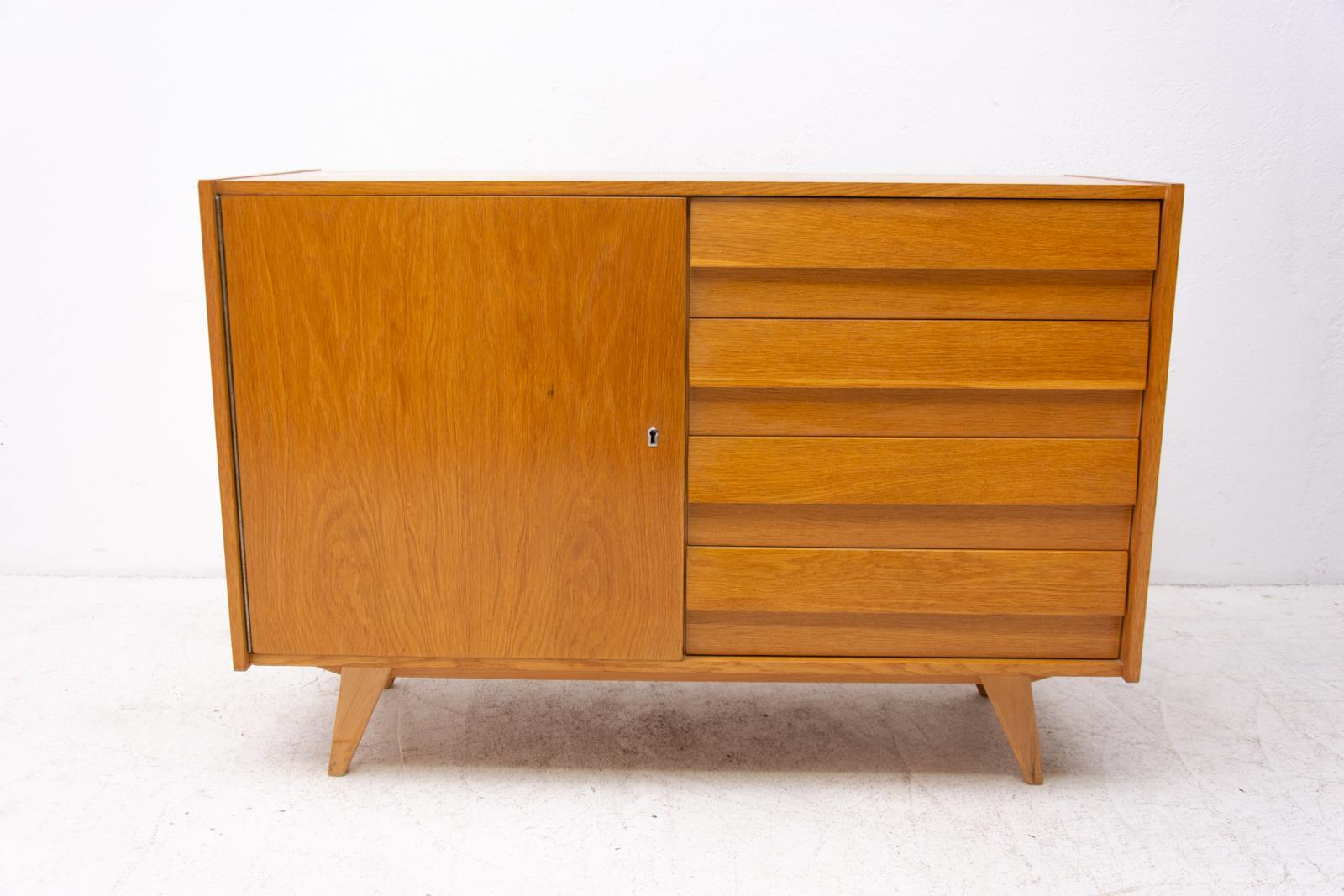 Midcentury chest of drawers, model no. U-458, designed by Jiri Jiroutek. It was made in the 1960s and produced by “Interier Praha”. This model associated with world-renowned EXPO 58-“Brussels period”. It features beechwood, plywood, veneered