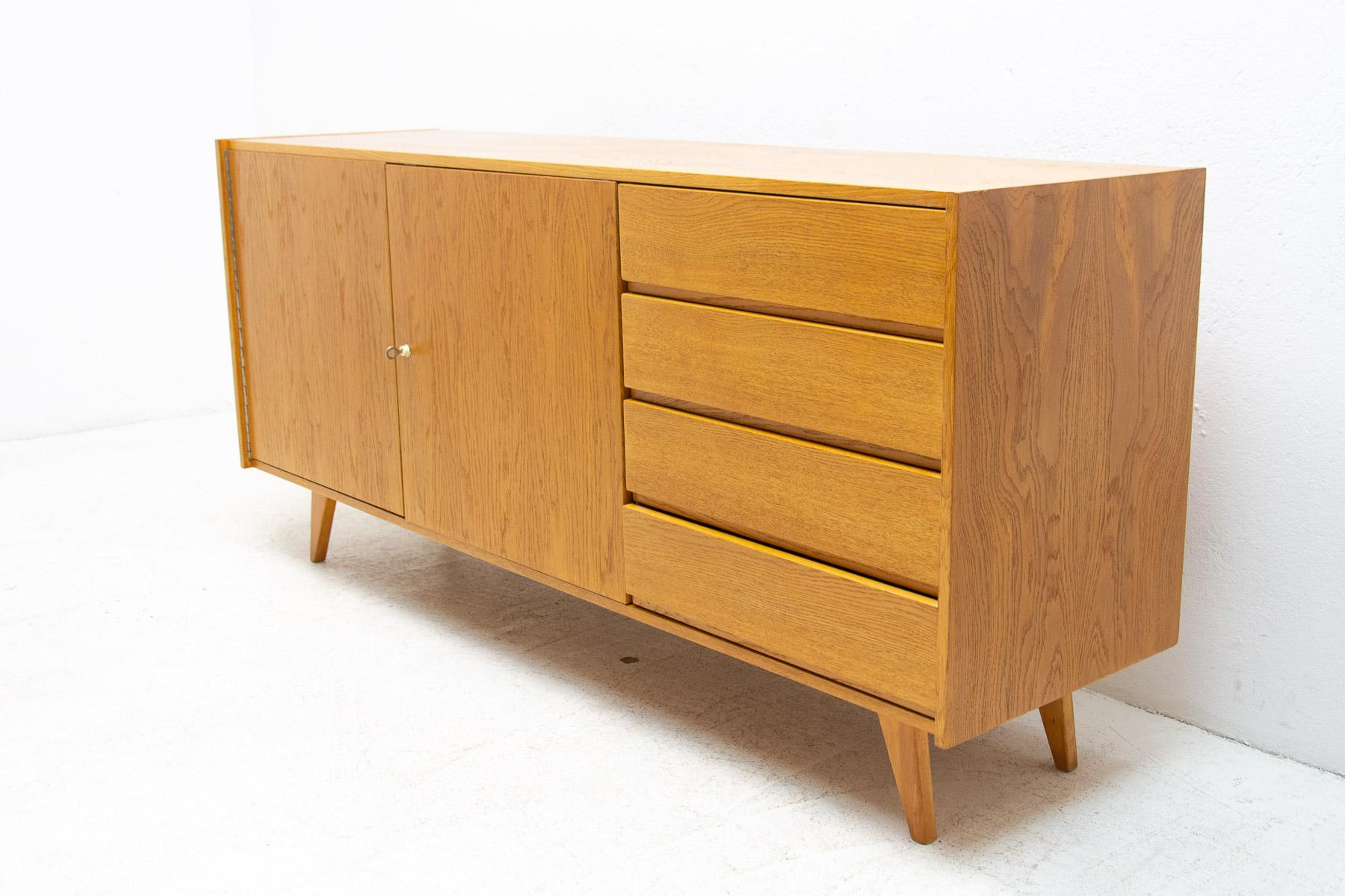 midcentury chest of drawers, model no. U-458, designed by Jiri Jiroutek. It was made in the 1960´s and produced by “Interier Praha”. This model associated with world-renowned EXPO 58-“Brussels period. It features beechwood, plywood, veneered