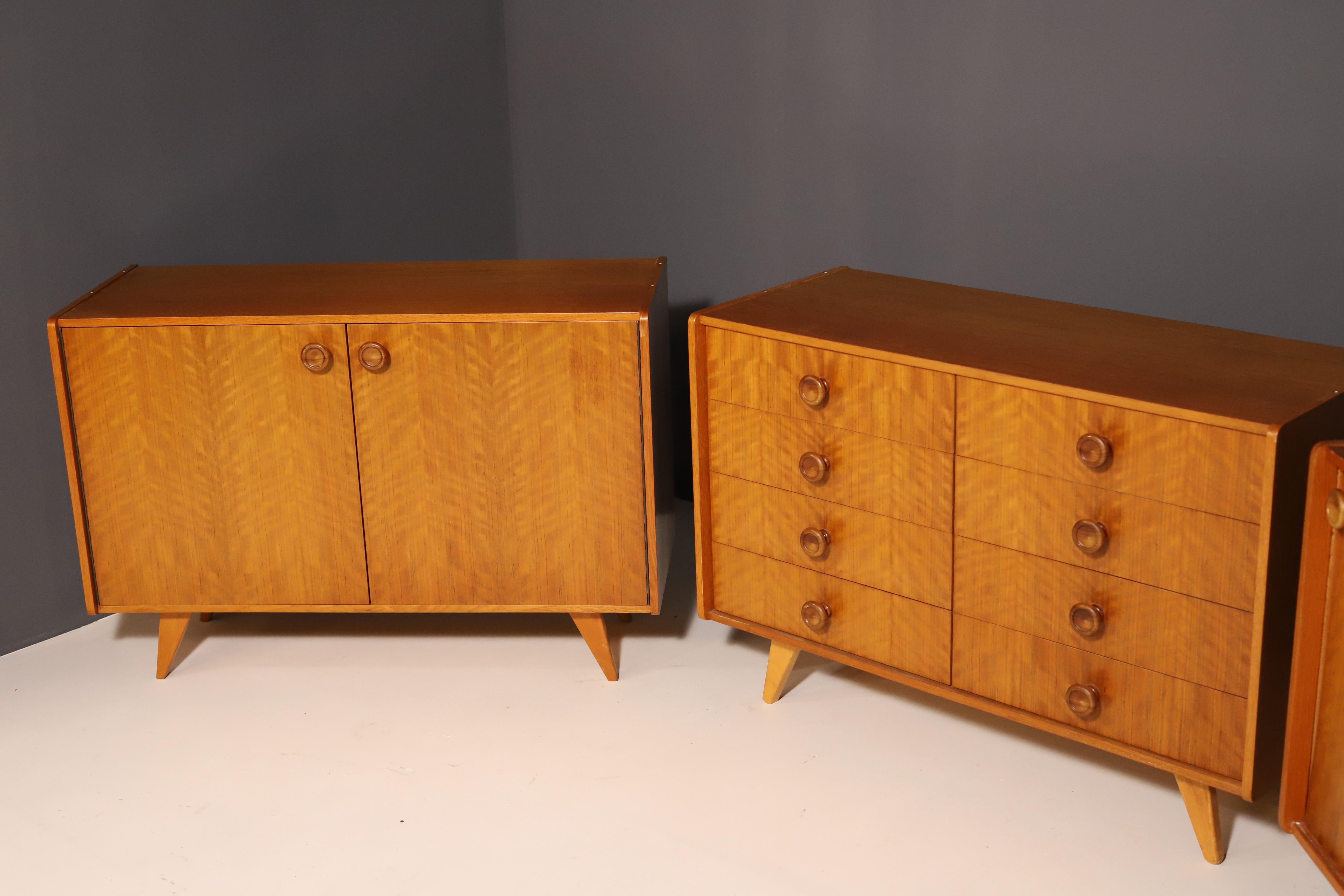 Mid century chest of drawers made by Jiří Jiroutek for Interiér Praha.

It’s a non-tradional version of well-known chest – catalogue No. U458 by Jiří Jiroutek.  Made of wood and plywood.  It´s in good Vintage condition, shows signs of age and
