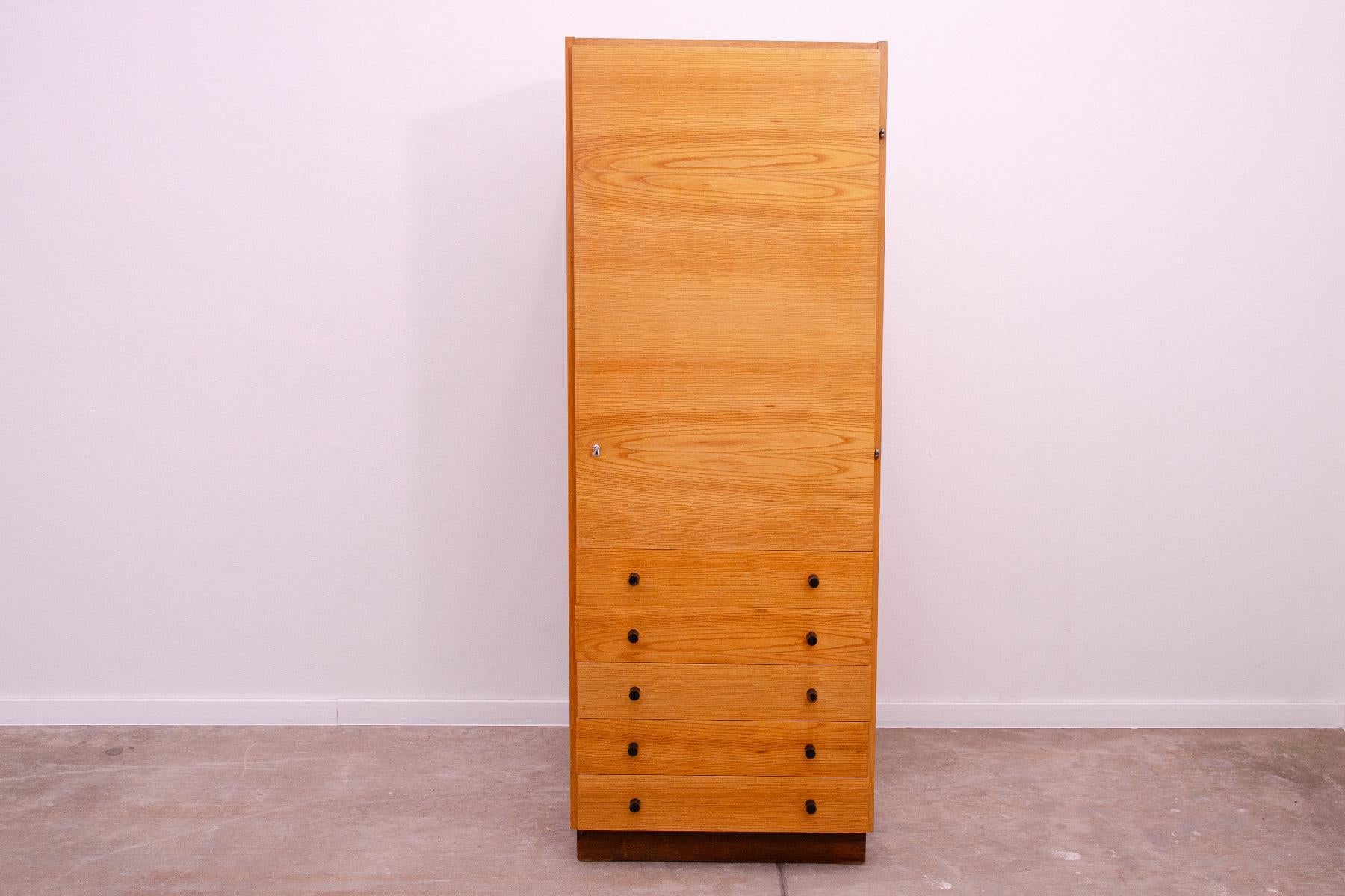 Multi-purpose cabinet or chest of drawers, designed by Mojmír Požár for ÚP Závody in the 1960s.  Made in a combination of ash, elm, maple, walnut, birch and poplar wood.  It´s in good Vintage condition, shows slight signs of age and using.

Height: 