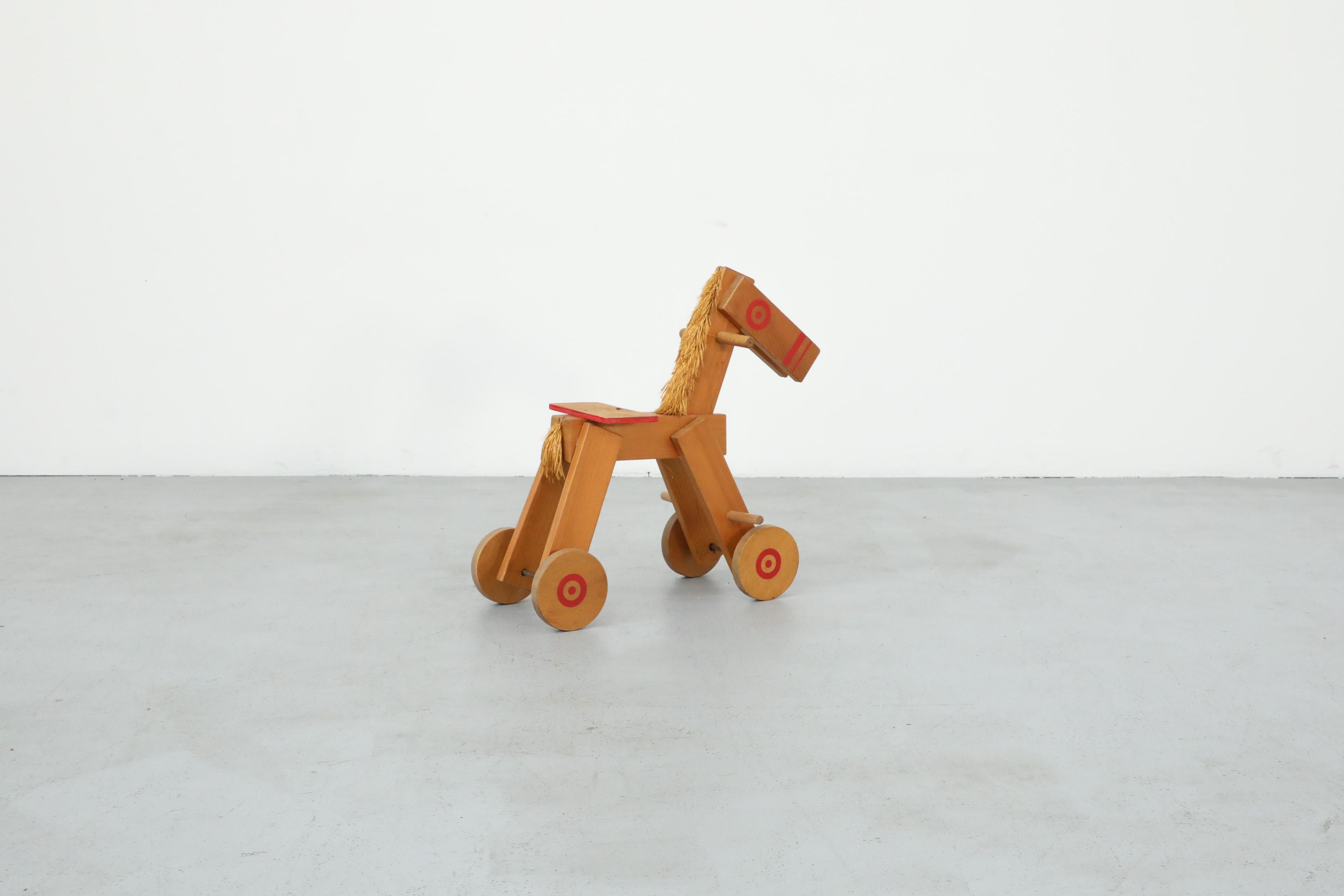 Hand-Painted Mid-Century Children's Wooden Pony with Wheels and Red Painted Details For Sale