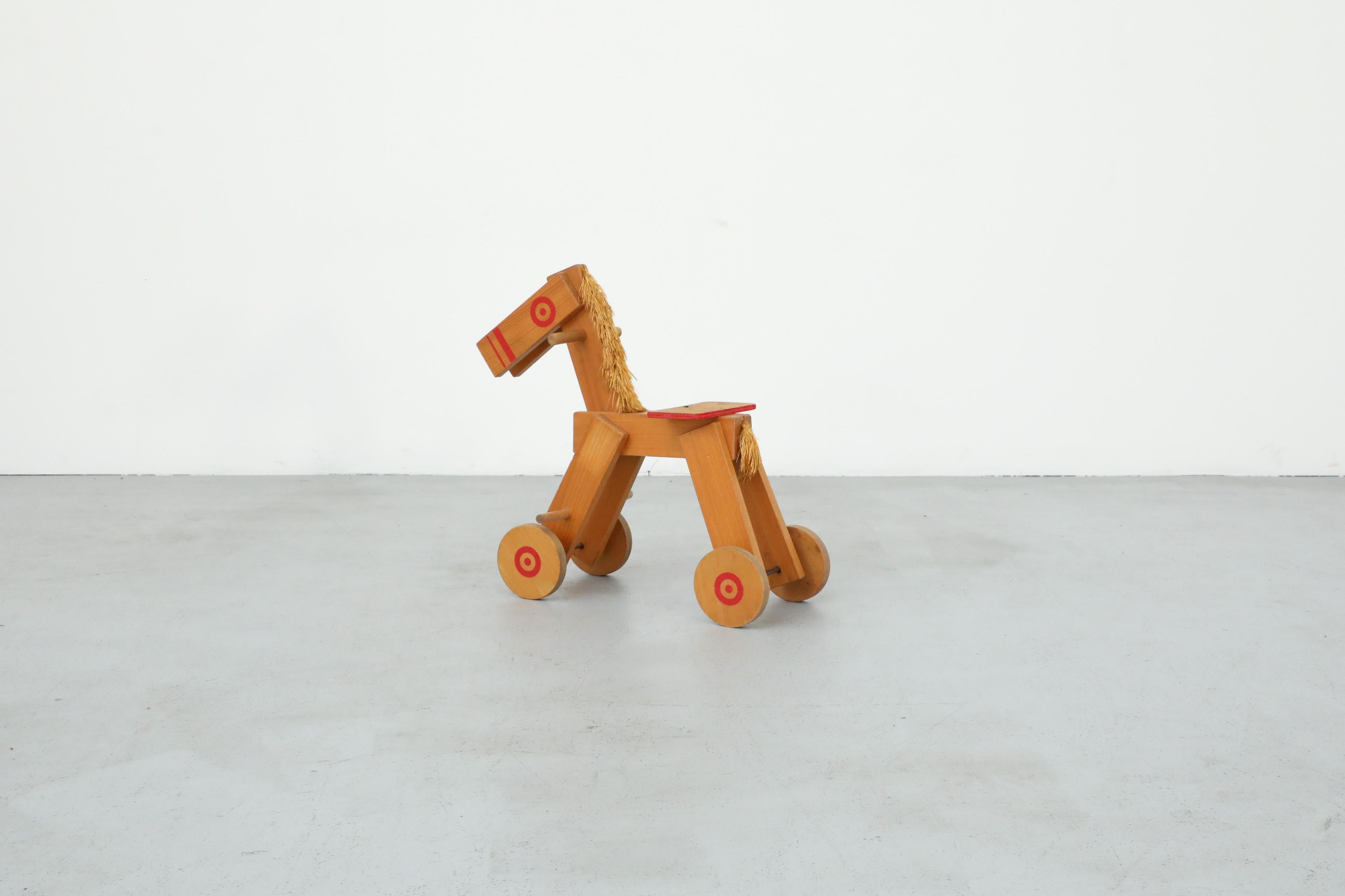 Mid-Century Children's Wooden Pony with Wheels and Red Painted Details In Good Condition For Sale In Los Angeles, CA