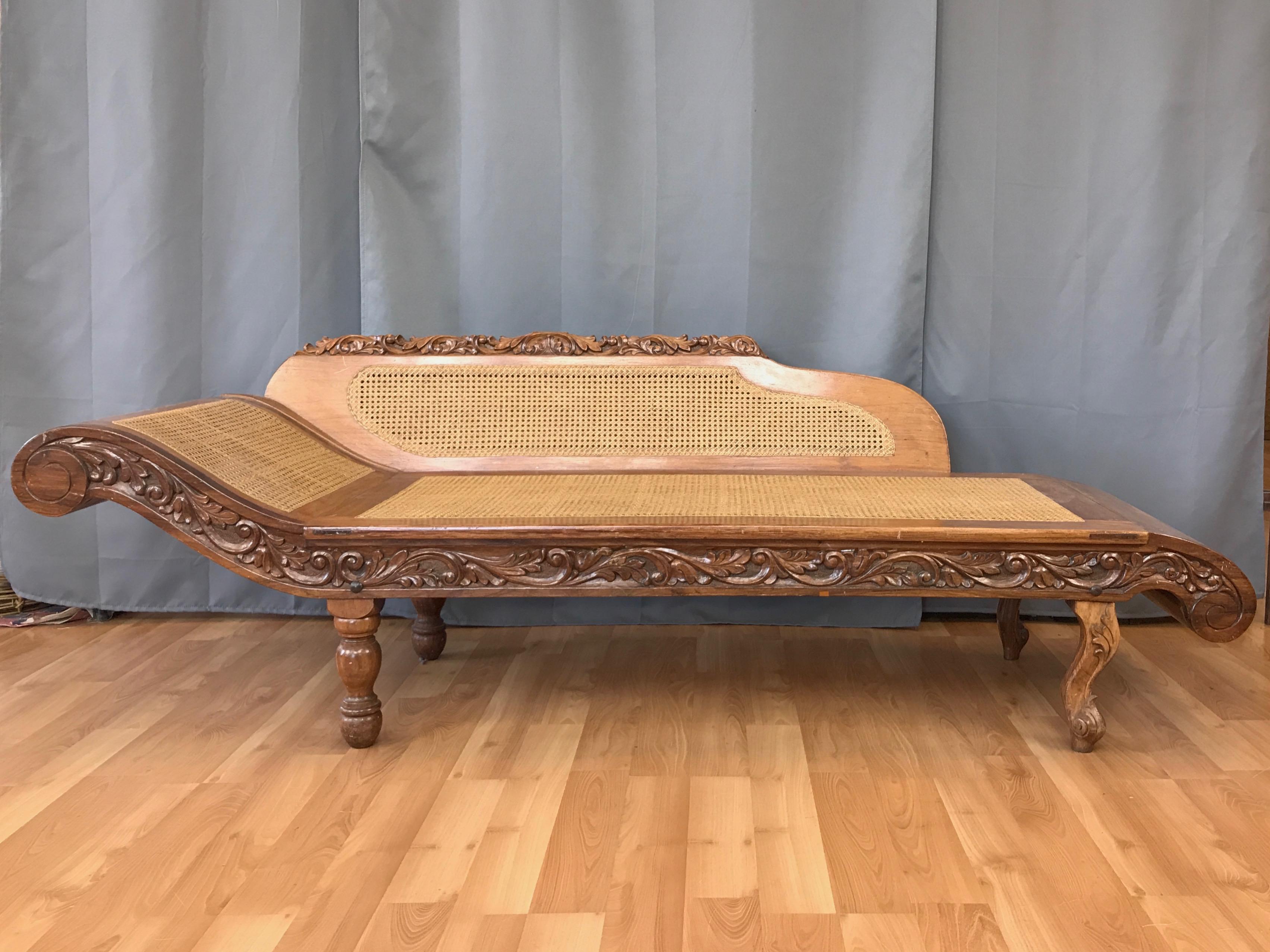 An impressively sized and well crafted mid-century Chinese daybed or chaise lounge in annatto wood and woven rattan.

Form inspired by the “Daybed for Imperial Concubine” (also known as the “Daybed for the Beauty”), which was a more petite piece of