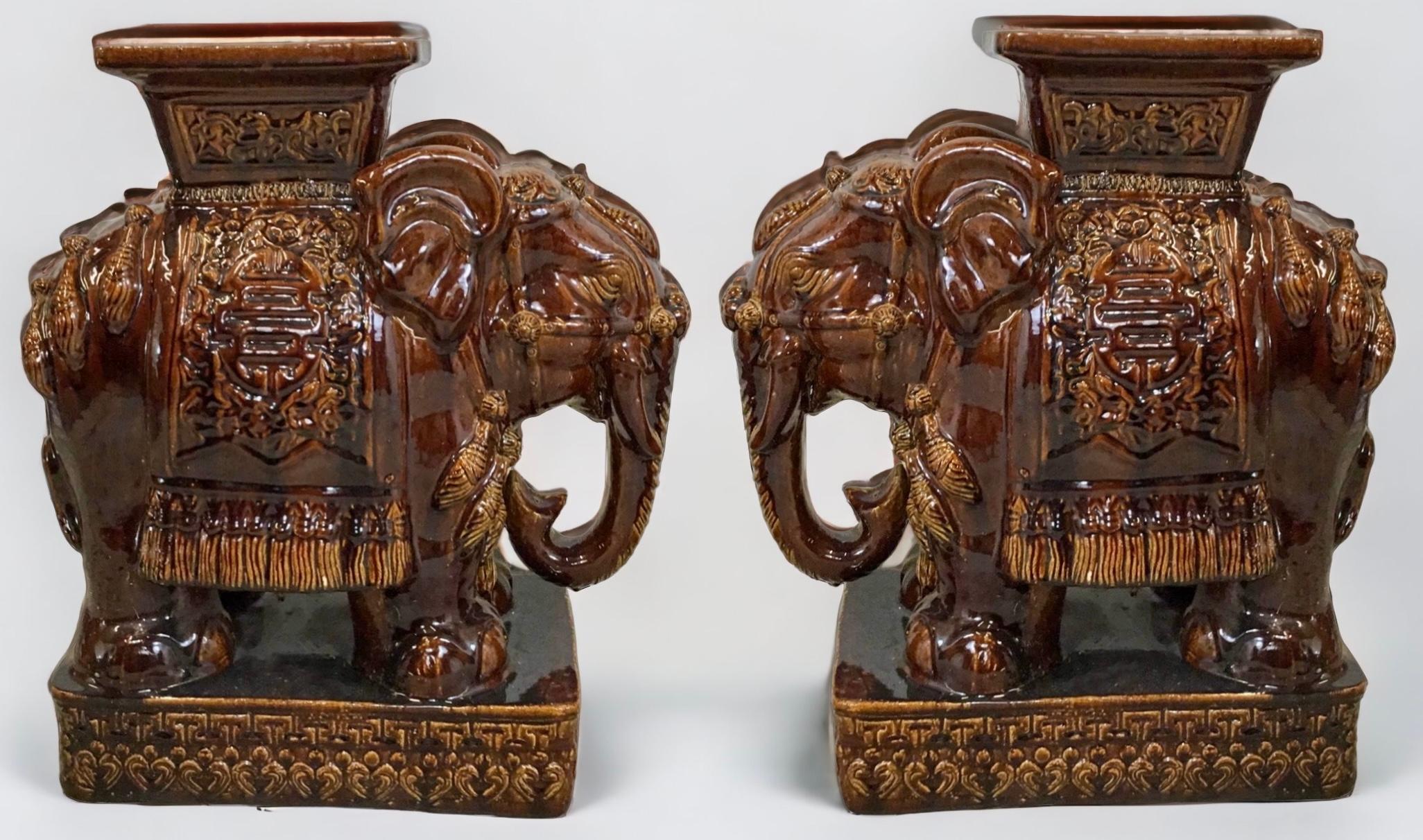 This is a pair of mid-century Chinese brown glazed heavy ceramic elephant garden seats or side tables. They have are unmarked and in very good condition. 
