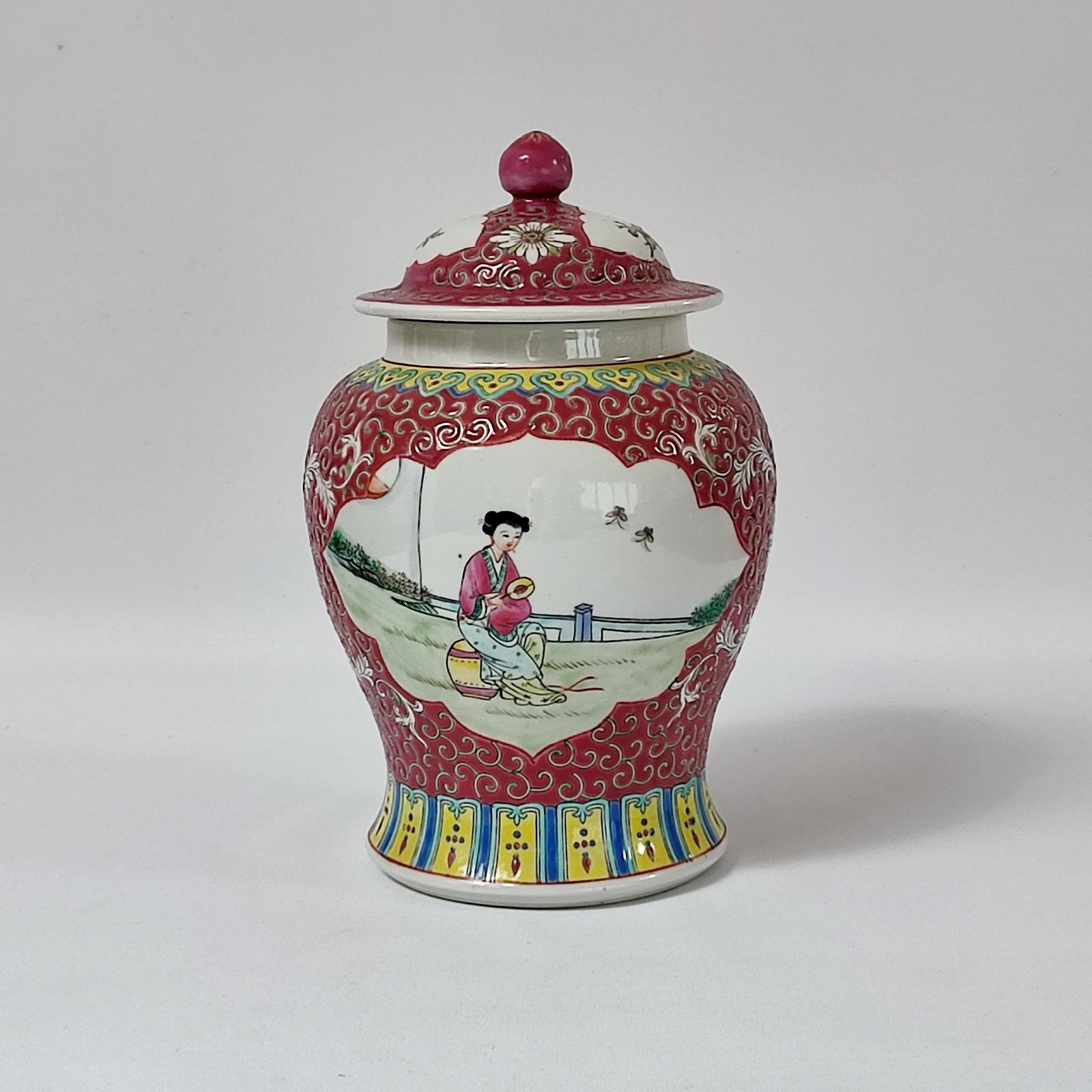 Mid-century early People Chinese Republic period hand enameled porcelain lidded urn vase, Jiangxi Jingdezhen Min Ci 6 Hao Cai mark under the bottom, Famille-rose

Dimensions: height 21 cm, diameter 13 cm.