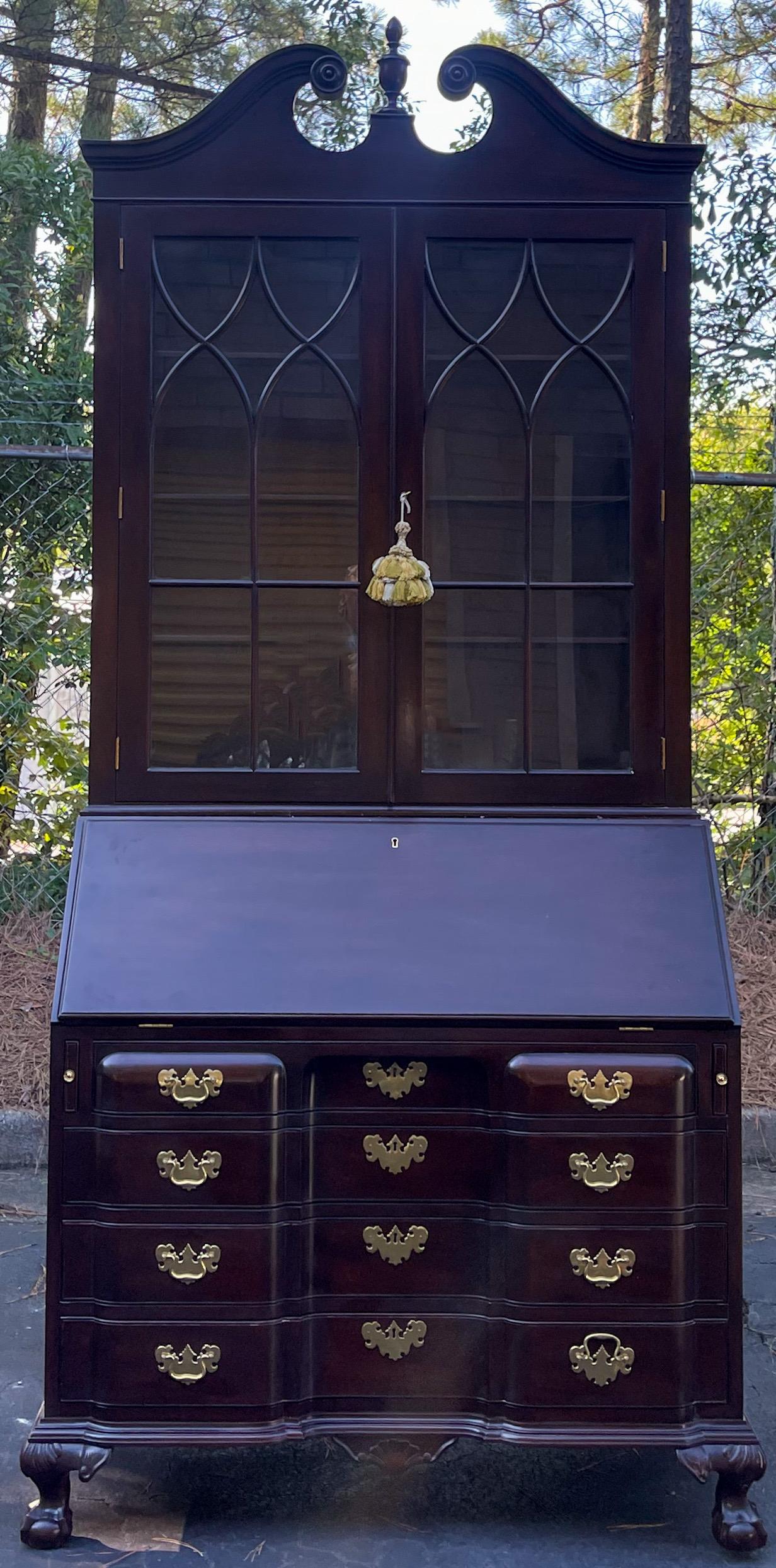 This is a classic piece! It is a Chinese Chippendale style mahogany secretary by Biggs Furniture. It is very good condition with ball and claw feet and brass hardware.