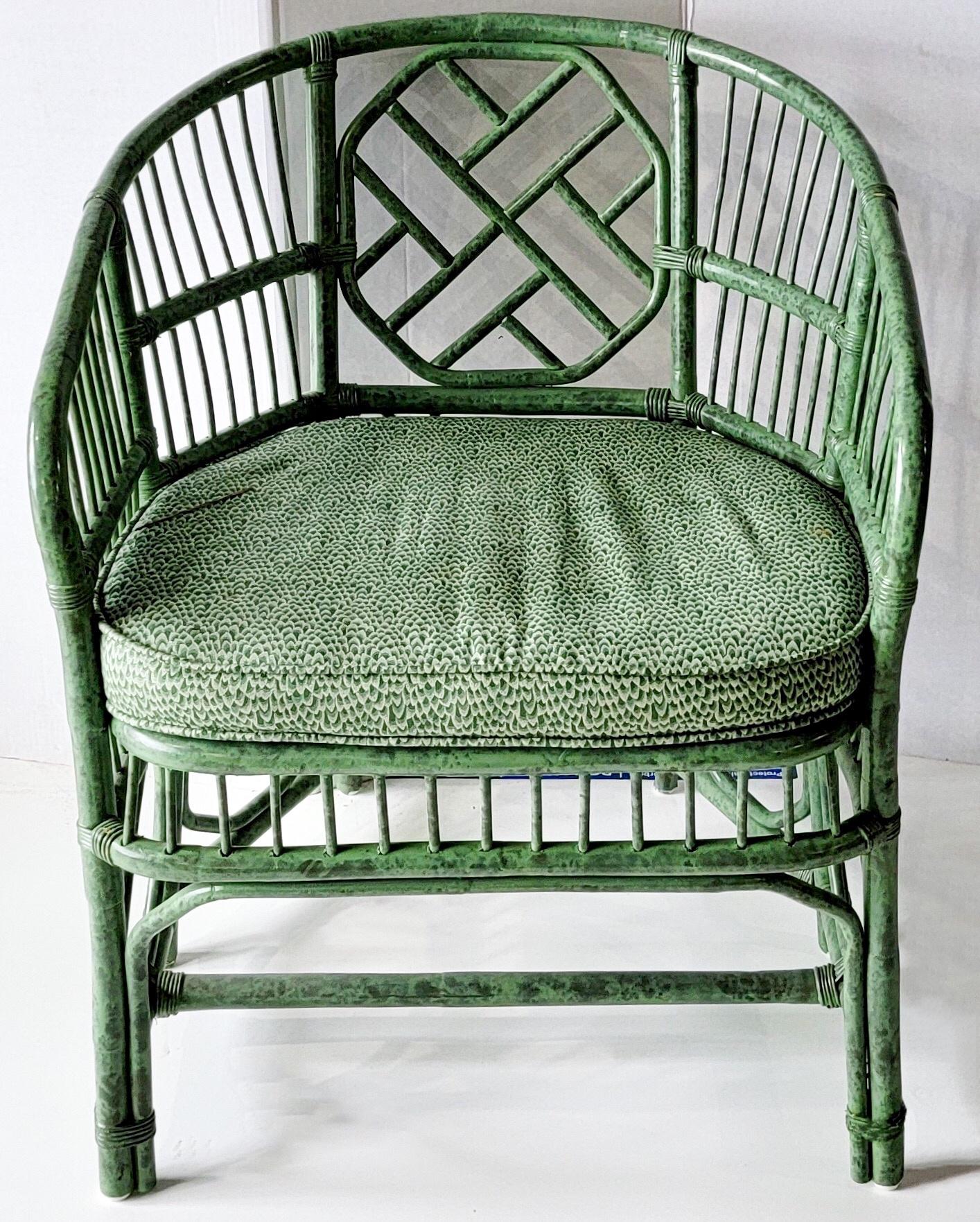This is a fun chippendale style Brighton bamboo chair in vintage chintz fabric. The frame is a two toned green as is the cushion. It is unmarked.