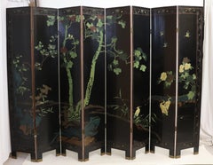 Mid-Century Chinese Coromandel Black Lacquered and Gilt Eight-Panel Screen